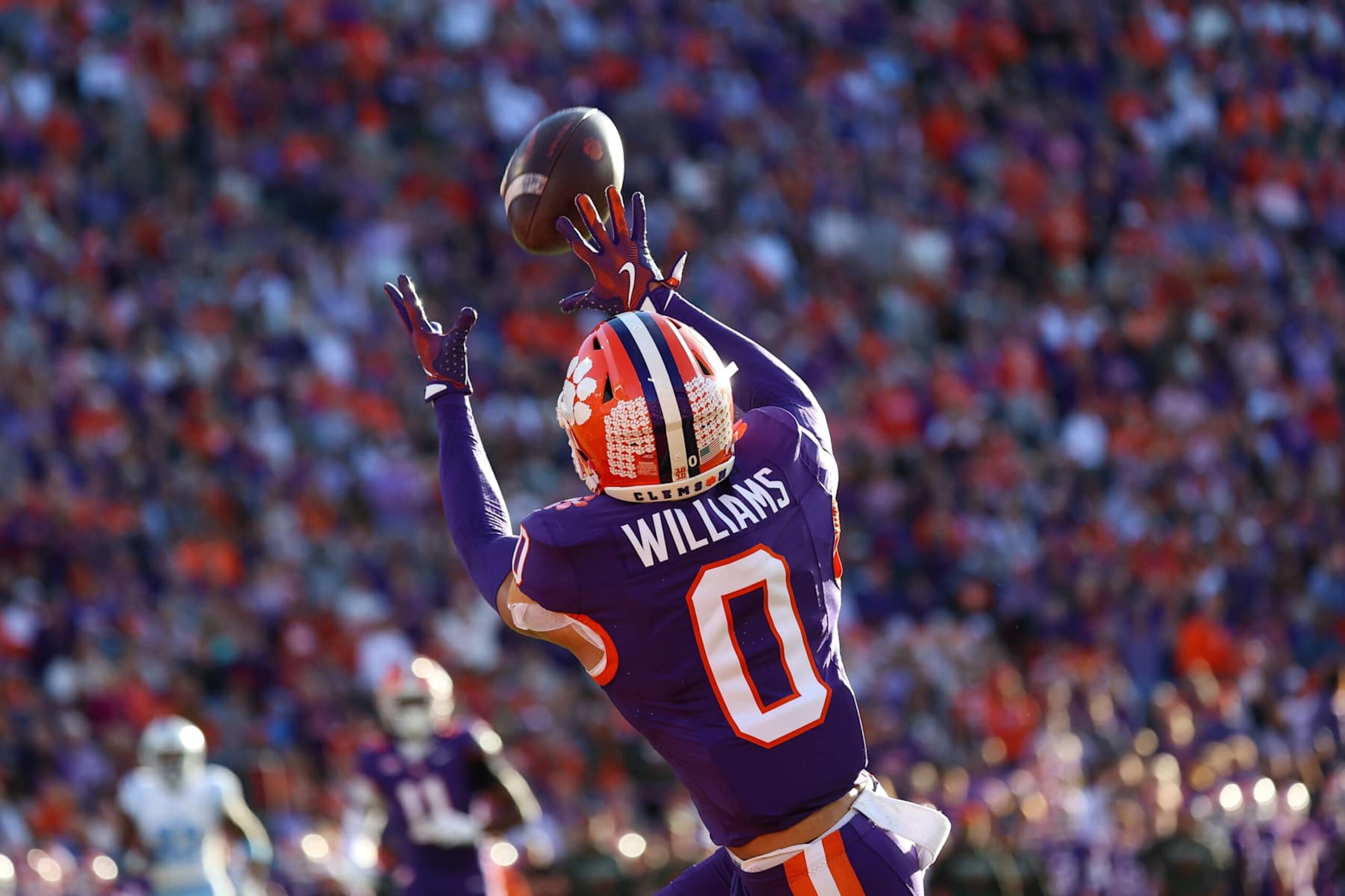 CLEMSON, SOUTH CAROLINA - NOVEMBER 23: Antonio Williams #0 of the Clemson Tigers catches a pass for a touchdown during the first quarter against the Citadel Bulldogs at Memorial Stadium on November 23, 2024 in Clemson, South Carolina. (Photo by Isaiah Vazquez/Getty Images) CLEMSON, SOUTH CAROLINA - NOVEMBER 23: Antonio Williams #0 of the Clemson Tigers catches a pass for a touchdown during the first quarter against the Citadel Bulldogs at Memorial Stadium on November 23, 2024 in Clemson, South Carolina. (Photo by Isaiah Vazquez/Getty Images)