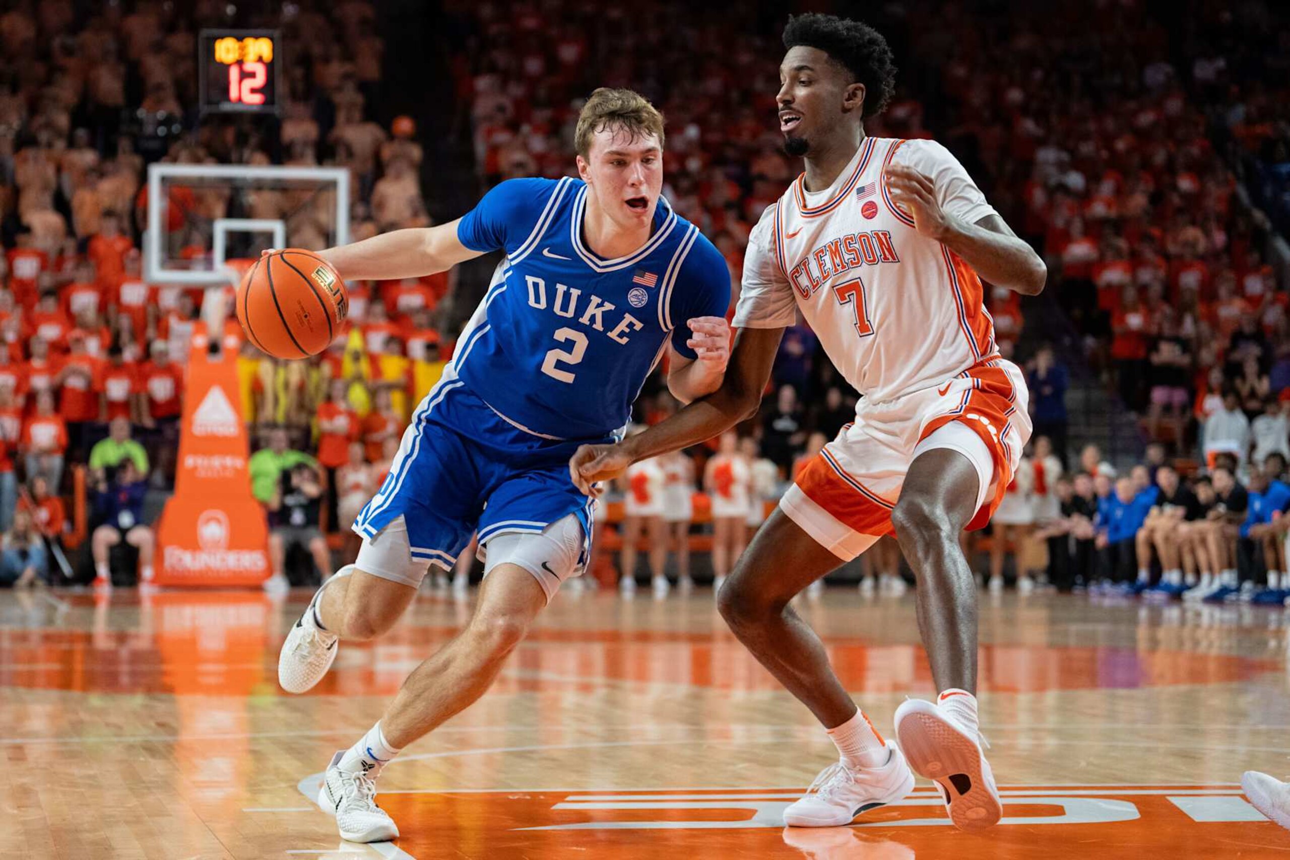 CLEMSON, SOUTH CAROLINA - FEBRUARY 08: Cooper Flagg #2 of the Duke Blue Devils drives to the basket while guarded by Chauncey Wiggins #7 of the Clemson Tigers in the first half during their game at Littlejohn Coliseum on February 08, 2025 in Clemson, South Carolina. (Photo by Jacob Kupferman/Getty Images) CLEMSON, SOUTH CAROLINA - FEBRUARY 08: Cooper Flagg #2 of the Duke Blue Devils drives to the basket while guarded by Chauncey Wiggins #7 of the Clemson Tigers in the first half during their game at Littlejohn Coliseum on February 08, 2025 in Clemson, South Carolina. (Photo by Jacob Kupferman/Getty Images)