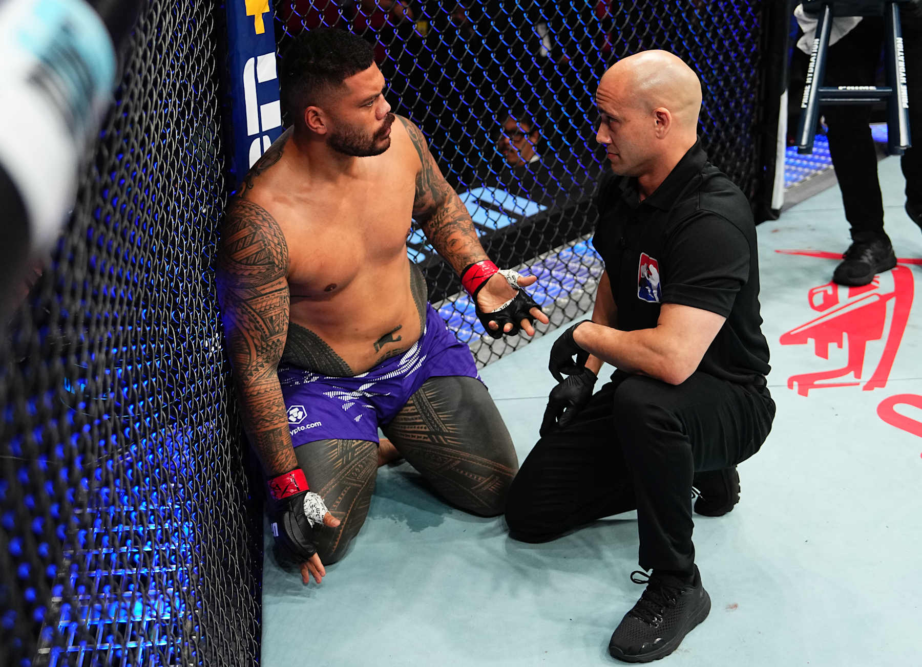 SYDNEY, AUSTRALIA - FEBRUARY 09: Justin Tafa of New Zealand protests after a knockout loss against Tallison Teixeira of Brazil in a heavyweight fight during the UFC 312 event at Qudos Bank Arena on February 09, 2025 in Sydney, Australia. (Photo by Jeff Bottari/Zuffa LLC) SYDNEY, AUSTRALIA - FEBRUARY 09: Justin Tafa of New Zealand protests after a knockout loss against Tallison Teixeira of Brazil in a heavyweight fight during the UFC 312 event at Qudos Bank Arena on February 09, 2025 in Sydney, Australia. (Photo by Jeff Bottari/Zuffa LLC)