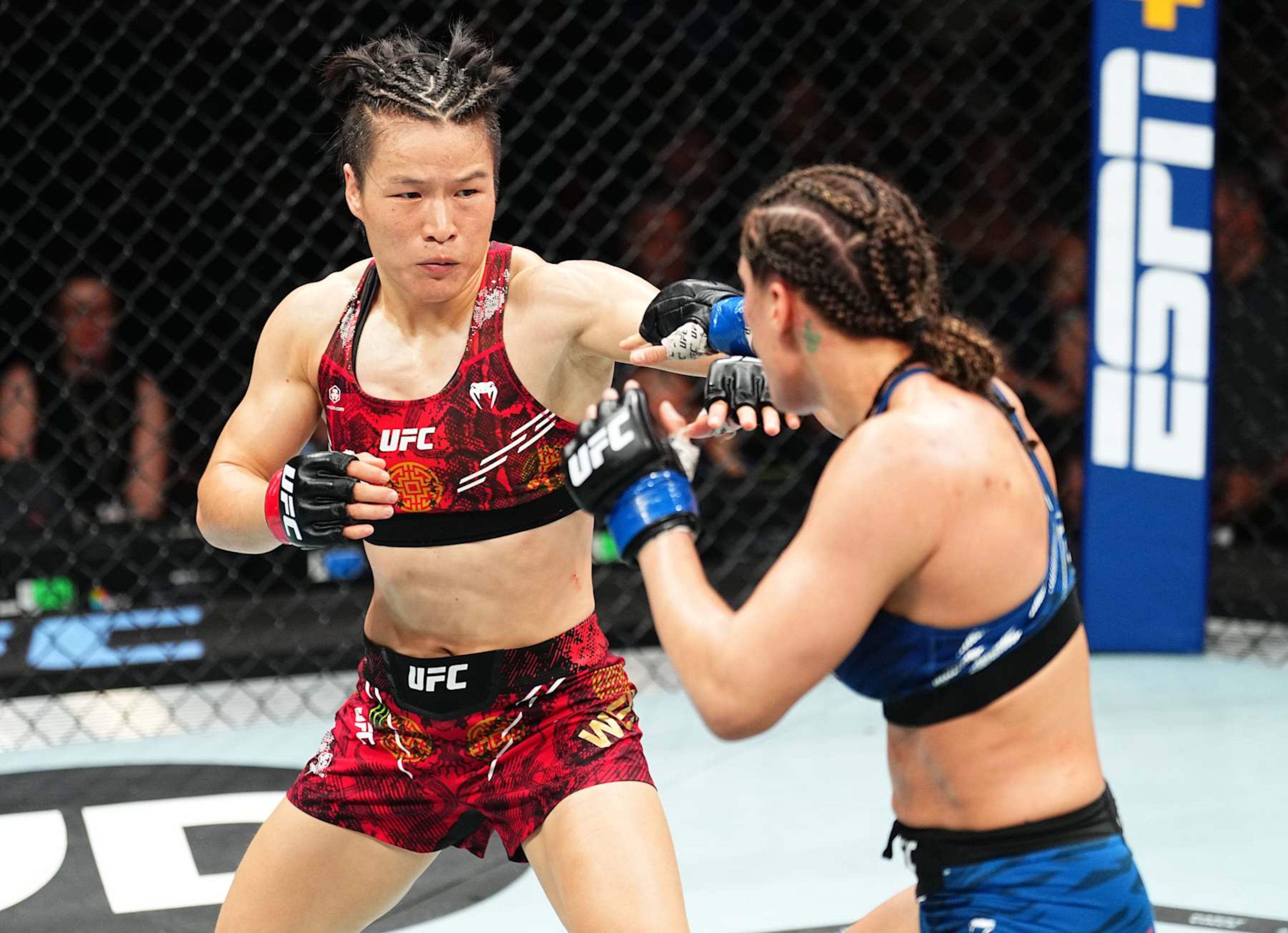 SYDNEY, AUSTRALIA - FEBRUARY 09: (L-R) Zhang Weili of China battles Tatiana Suarez in the UFC strawweight championship fight during the UFC 312 event at Qudos Bank Arena on February 09, 2025 in Sydney, Australia.  (Photo by Jeff Bottari/Zuffa LLC)