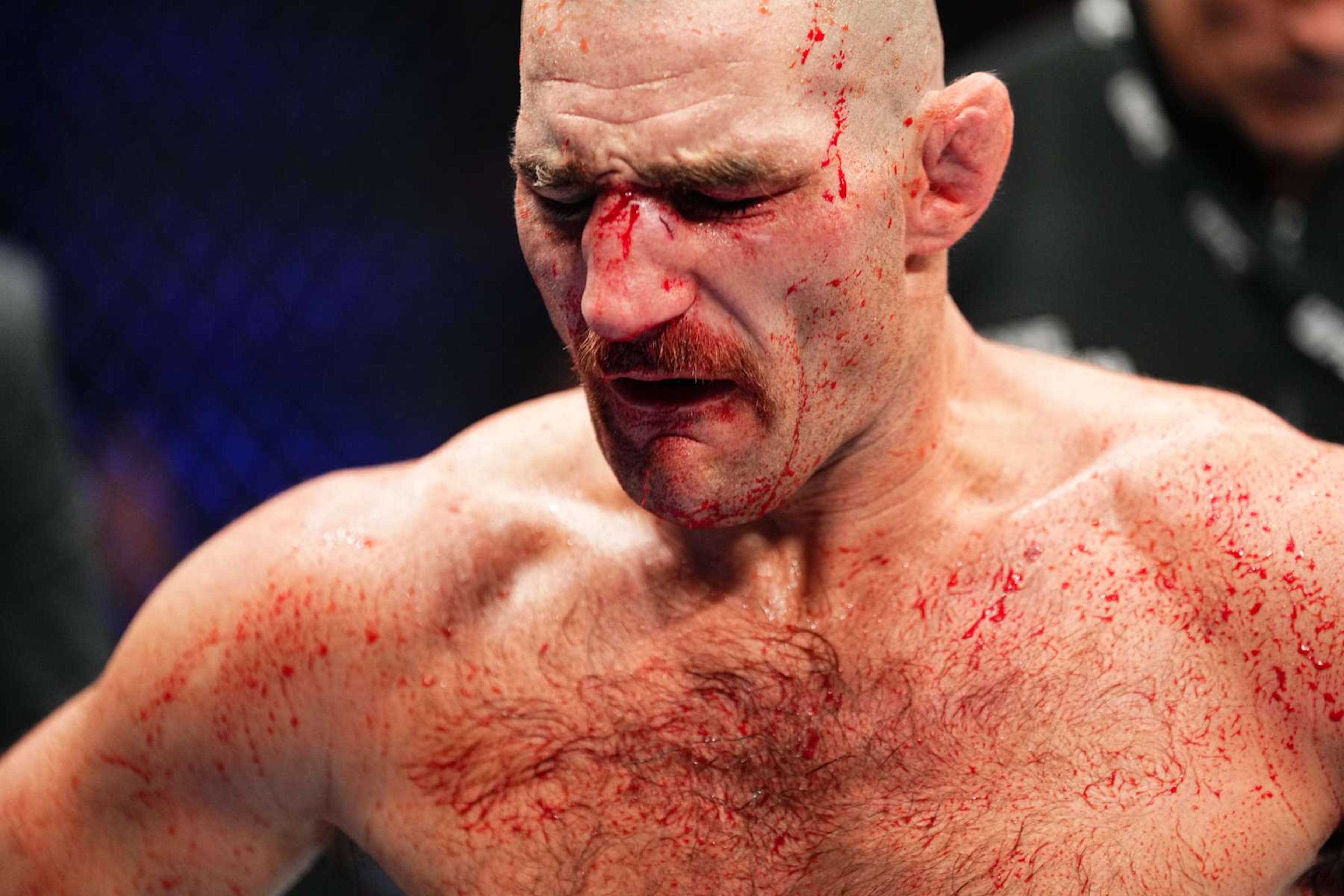 SYDNEY, AUSTRALIA - FEBRUARY 09: Sean Strickland reacts after his UFC middleweight championship fight against Dricus Du Plessis of South Africa during the UFC 312 event at Qudos Bank Arena on February 09, 2025 in Sydney, Australia.  (Photo by Jeff Bottari/Zuffa LLC)