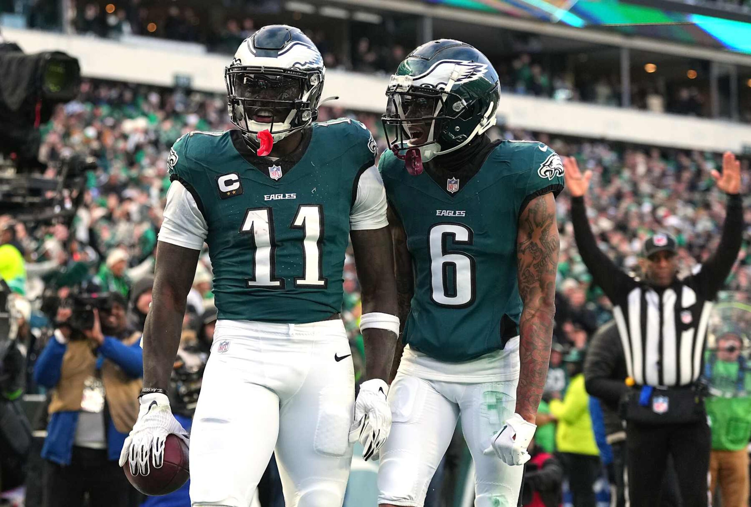 PHILADELPHIA, PENNSYLVANIA - JANUARY 26: A.J. Brown #11 of the Philadelphia Eagles celebrates his touchdown catch with teammate DeVonta Smith #6 while playing against the Washington Commanders during the second quarter in the NFC Championship Game at Lincoln Financial Field on January 26, 2025 in Philadelphia, Pennsylvania. (Photo by Mitchell Leff/Getty Images) PHILADELPHIA, PENNSYLVANIA - JANUARY 26: A.J. Brown #11 of the Philadelphia Eagles celebrates his touchdown catch with teammate DeVonta Smith #6 while playing against the Washington Commanders during the second quarter in the NFC Championship Game at Lincoln Financial Field on January 26, 2025 in Philadelphia, Pennsylvania. (Photo by Mitchell Leff/Getty Images)