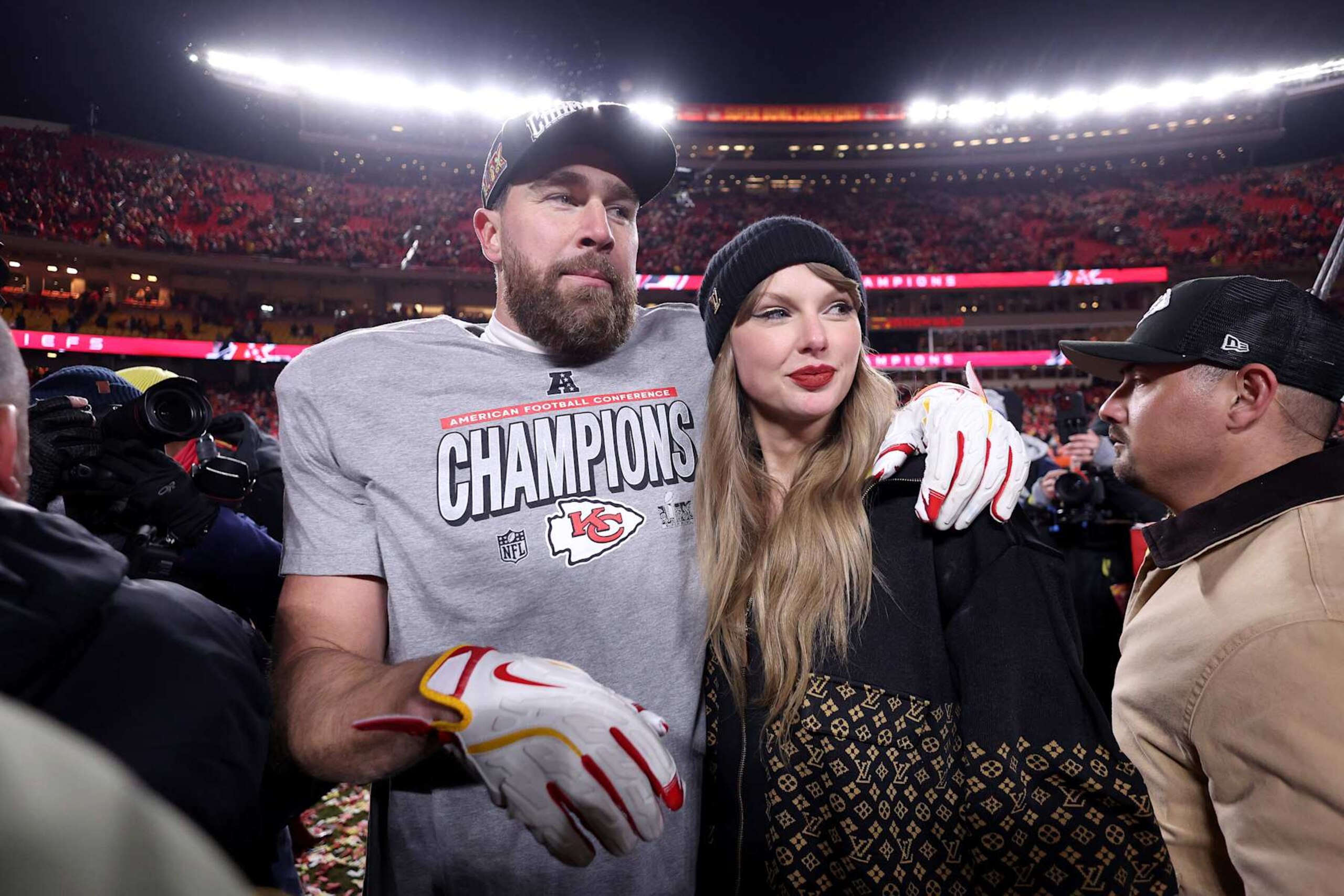 KANSAS CITY, MISSOURI - JANUARY 26: Taylor Swift celebrates with Travis Kelce #87 of the Kansas City Chiefs after defeating the Buffalo Bills 32-29 in the AFC Championship Game at GEHA Field at Arrowhead Stadium on January 26, 2025 in Kansas City, Missouri. (Photo by Jamie Squire/Getty Images) KANSAS CITY, MISSOURI - JANUARY 26: Taylor Swift celebrates with Travis Kelce #87 of the Kansas City Chiefs after defeating the Buffalo Bills 32-29 in the AFC Championship Game at GEHA Field at Arrowhead Stadium on January 26, 2025 in Kansas City, Missouri. (Photo by Jamie Squire/Getty Images)