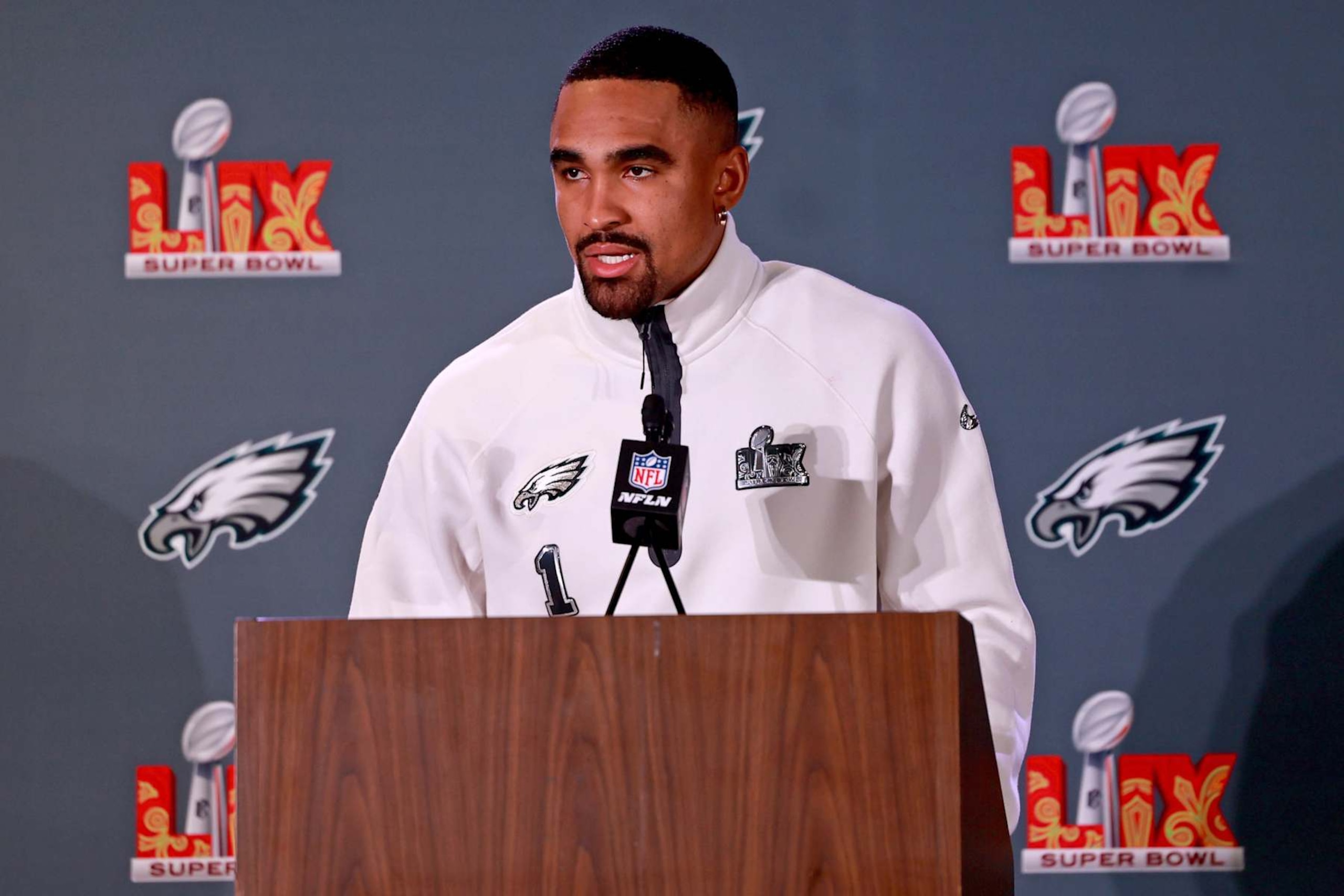 NEW ORLEANS, LOUISIANA - FEBRUARY 5: Quarterback Jalen Hurts #1 of the Philadelphia Eagles answers questions during the team's Wednesday media availability ahead of Super Bowl LIX at the Hilton New Orleans Riverside Hotel on February 5, 2025 in New Orleans, Louisiana. The Eagles face the Kansas City Chiefs this Sunday in the Caesars Superdome. (Photo by Michael DeMocker/Getty Images) NEW ORLEANS, LOUISIANA - FEBRUARY 5: Quarterback Jalen Hurts #1 of the Philadelphia Eagles answers questions during the team's Wednesday media availability ahead of Super Bowl LIX at the Hilton New Orleans Riverside Hotel on February 5, 2025 in New Orleans, Louisiana. The Eagles face the Kansas City Chiefs this Sunday in the Caesars Superdome. (Photo by Michael DeMocker/Getty Images)