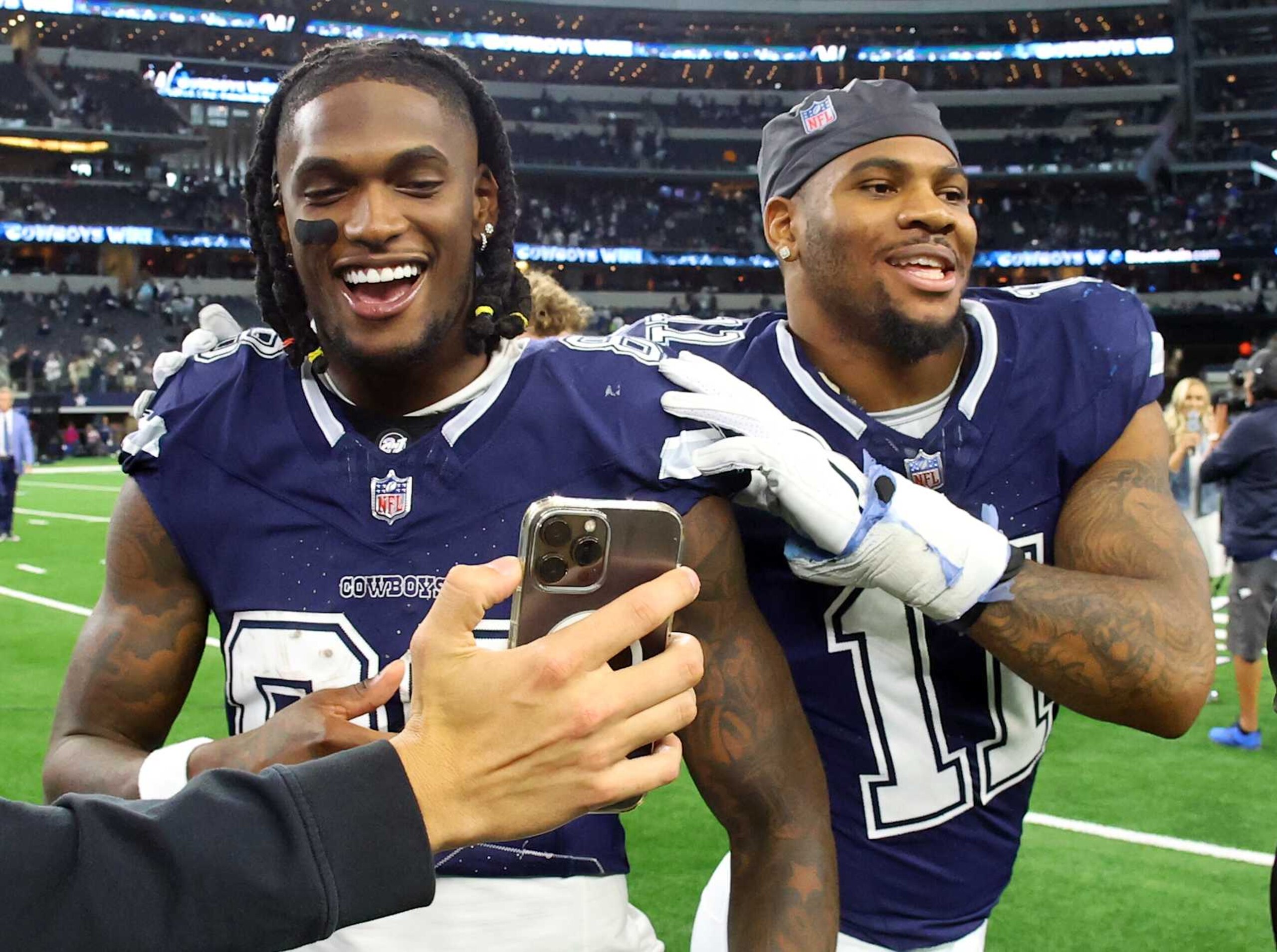 ARLINGTON, TEXAS - OCTOBER 29: CeeDee Lamb #88 and Micah Parsons #11 of the Dallas Cowboys celebrate after the win over the Los Angeles Rams at AT&T Stadium on October 29, 2023 in Arlington, Texas. (Photo by Richard Rodriguez/Getty Images)