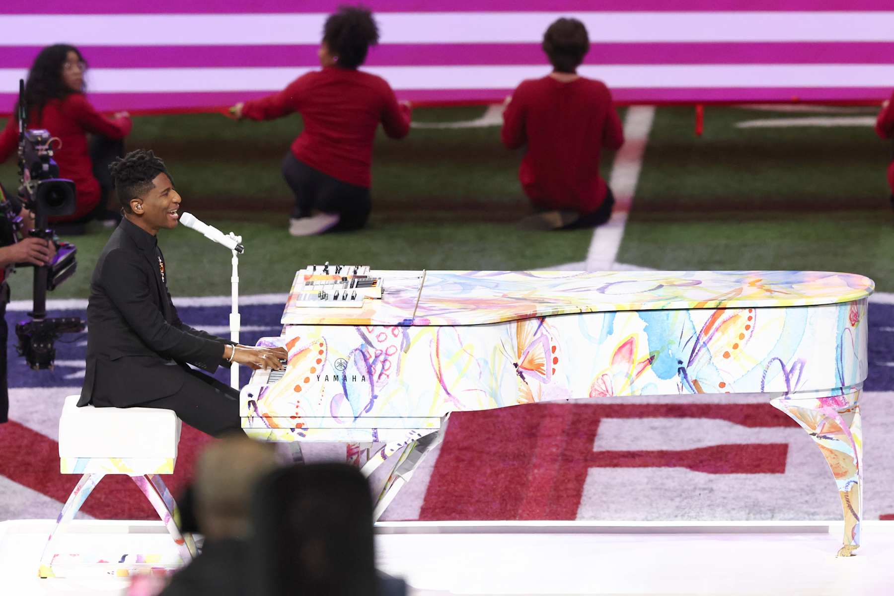 NEW ORLEANS, LOUISIANA - FEBRUARY 09: Jon Batiste performs the National Anthem onstage prior to Super Bowl LIX at Caesars Superdome on February 09, 2025 in New Orleans, Louisiana.  (Photo by Cindy Ord/Getty Images)