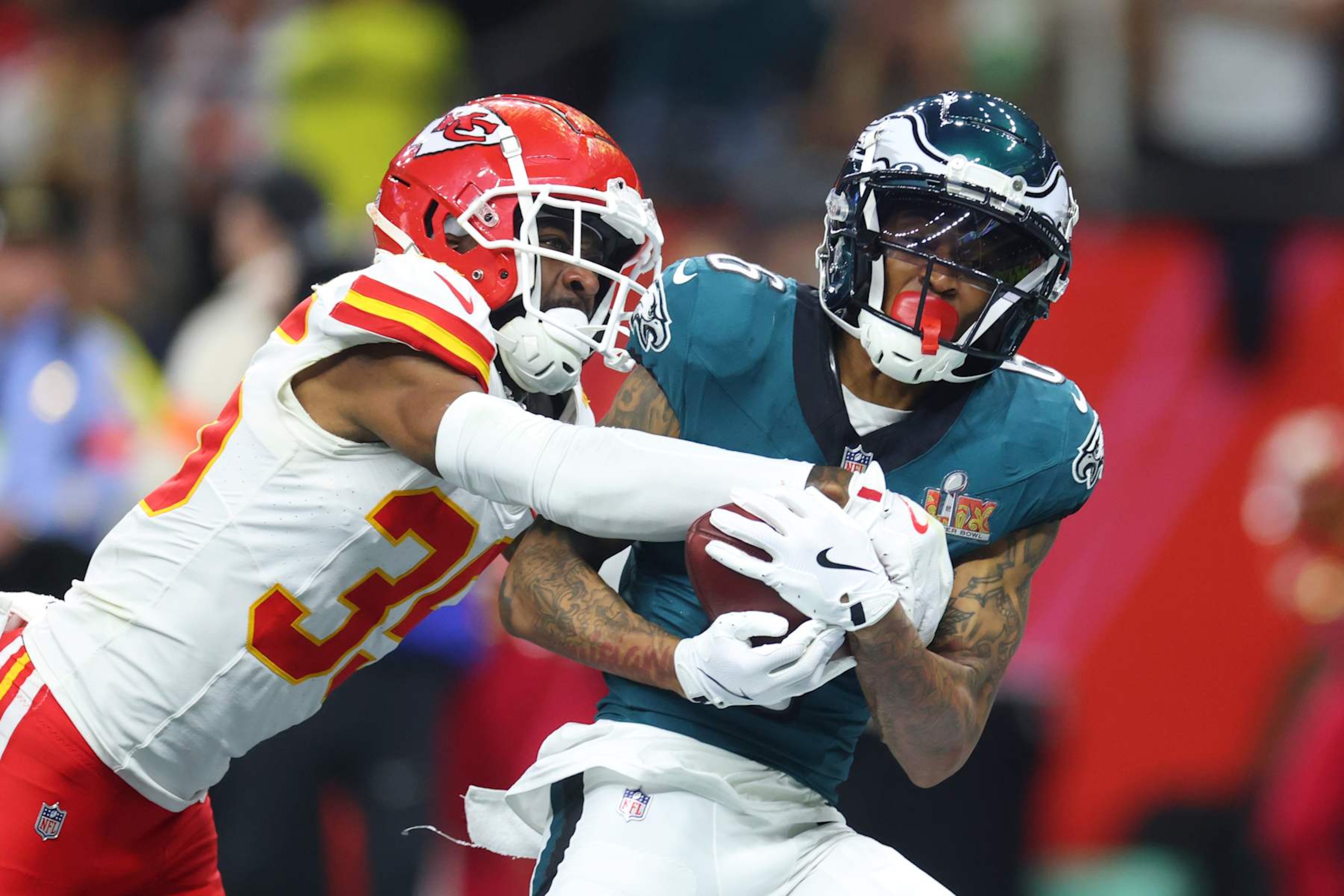 NEW ORLEANS, LOUISIANA - FEBRUARY 09: DeVonta Smith #6 of the Philadelphia Eagles makes a catch for a touchdown past Jaylen Watson #35 of the Kansas City Chiefs in the third quarter during Super Bowl LIX at Caesars Superdome on February 09, 2025 in New Orleans, Louisiana. (Photo by Gregory Shamus/Getty Images)