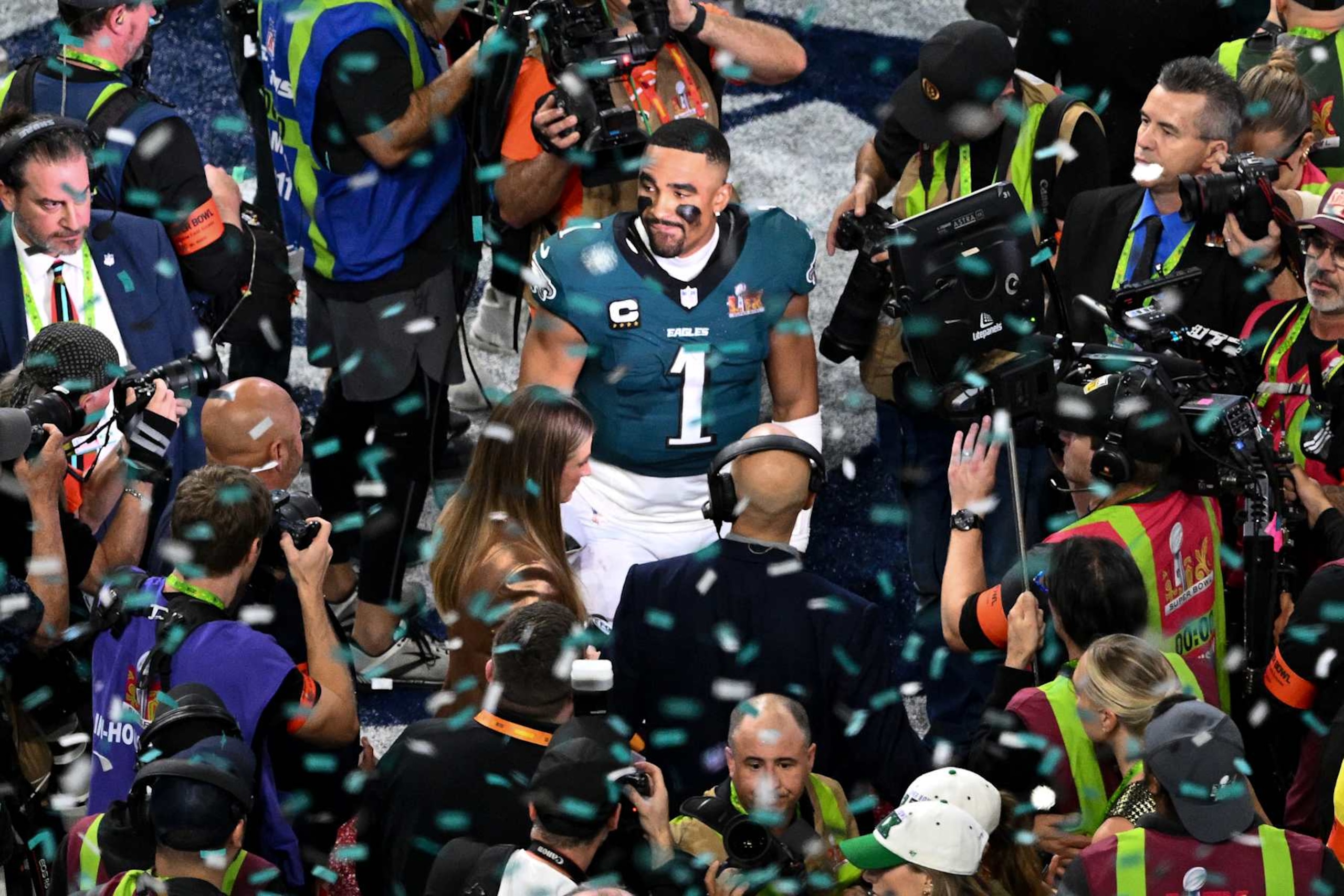 Philadelphia Eagles' quarterback #01 Jalen Hurts looks on after the Philadelphia Eagles won Super Bowl LIX against the Kansas City Chiefs at Caesars Superdome in New Orleans, Louisiana, February 9, 2025. (Photo by Chandan Khanna / AFP) (Photo by CHANDAN KHANNA/AFP via Getty Images) Philadelphia Eagles' quarterback #01 Jalen Hurts looks on after the Philadelphia Eagles won Super Bowl LIX against the Kansas City Chiefs at Caesars Superdome in New Orleans, Louisiana, February 9, 2025. (Photo by Chandan Khanna / AFP) (Photo by CHANDAN KHANNA/AFP via Getty Images)
