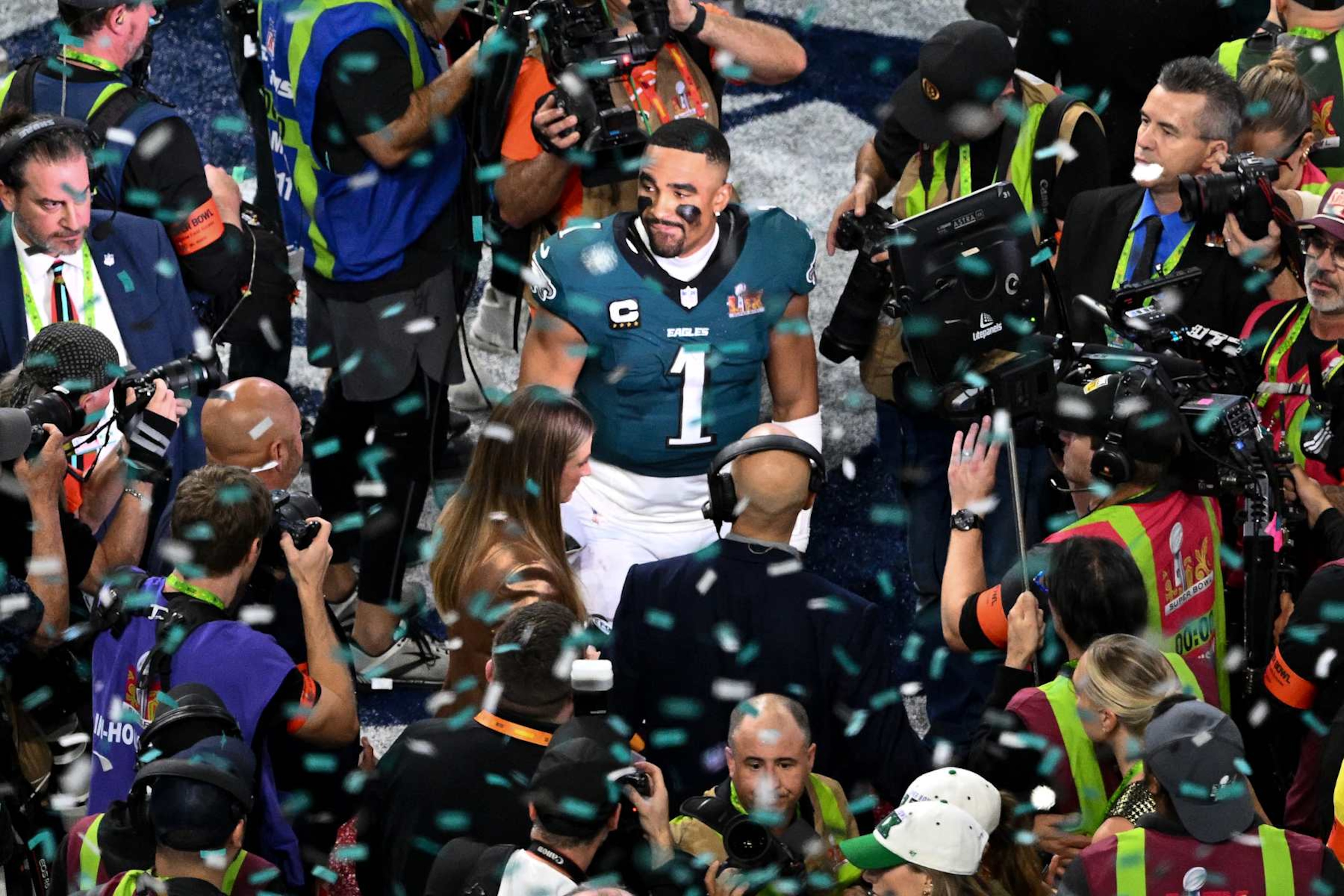 Philadelphia Eagles' quarterback #01 Jalen Hurts looks on after the Philadelphia Eagles won Super Bowl LIX against the Kansas City Chiefs at Caesars Superdome in New Orleans, Louisiana, February 9, 2025. (Photo by Chandan Khanna / AFP) (Photo by CHANDAN KHANNA/AFP via Getty Images) Philadelphia Eagles' quarterback #01 Jalen Hurts looks on after the Philadelphia Eagles won Super Bowl LIX against the Kansas City Chiefs at Caesars Superdome in New Orleans, Louisiana, February 9, 2025. (Photo by Chandan Khanna / AFP) (Photo by CHANDAN KHANNA/AFP via Getty Images)