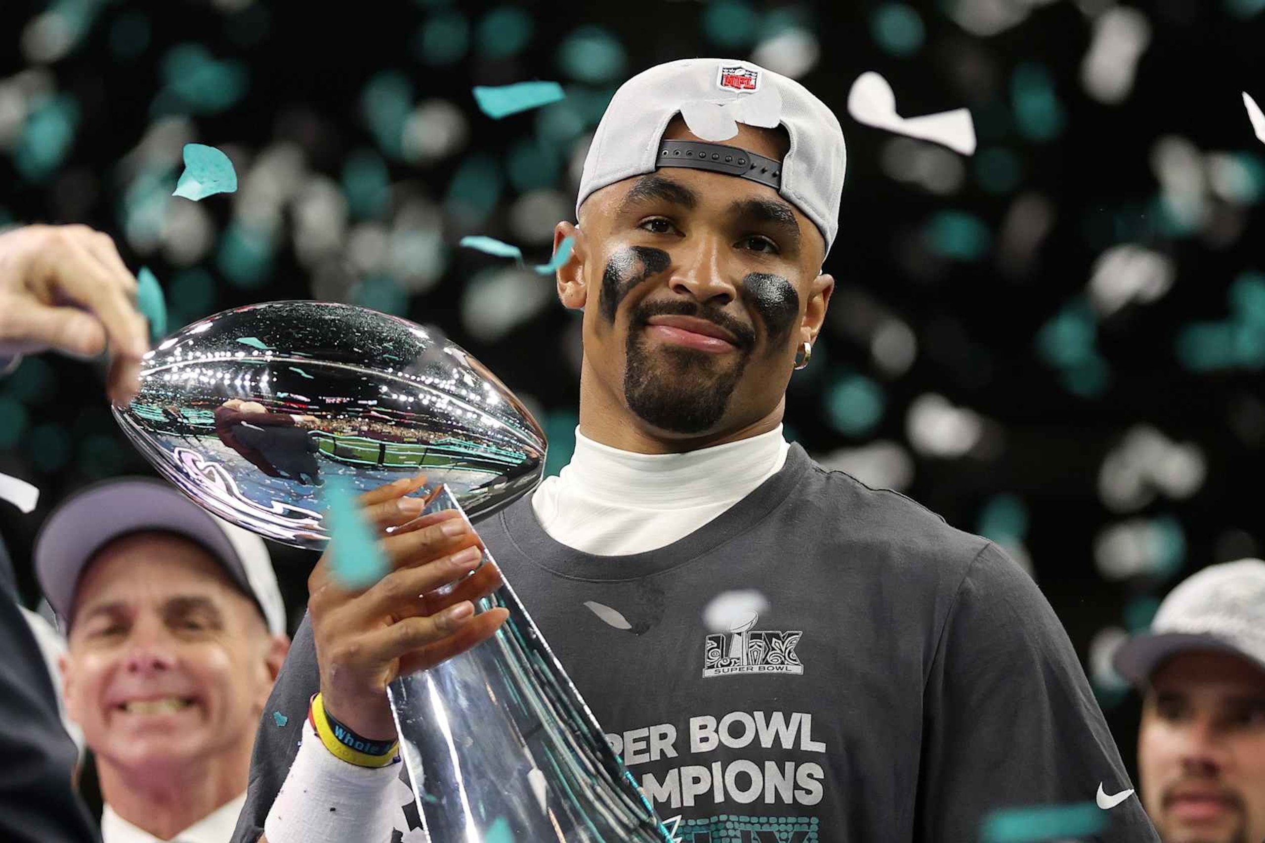 NEW ORLEANS, LOUISIANA - FEBRUARY 09: Jalen Hurts #1 of the Philadelphia Eagles celebrates with the Vince Lombardi Trophy after defeating the Kansas City Chiefs 40-22 to win Super Bowl LIX at Caesars Superdome on February 09, 2025 in New Orleans, Louisiana. (Photo by Jamie Squire/Getty Images) NEW ORLEANS, LOUISIANA - FEBRUARY 09: Jalen Hurts #1 of the Philadelphia Eagles celebrates with the Vince Lombardi Trophy after defeating the Kansas City Chiefs 40-22 to win Super Bowl LIX at Caesars Superdome on February 09, 2025 in New Orleans, Louisiana. (Photo by Jamie Squire/Getty Images)