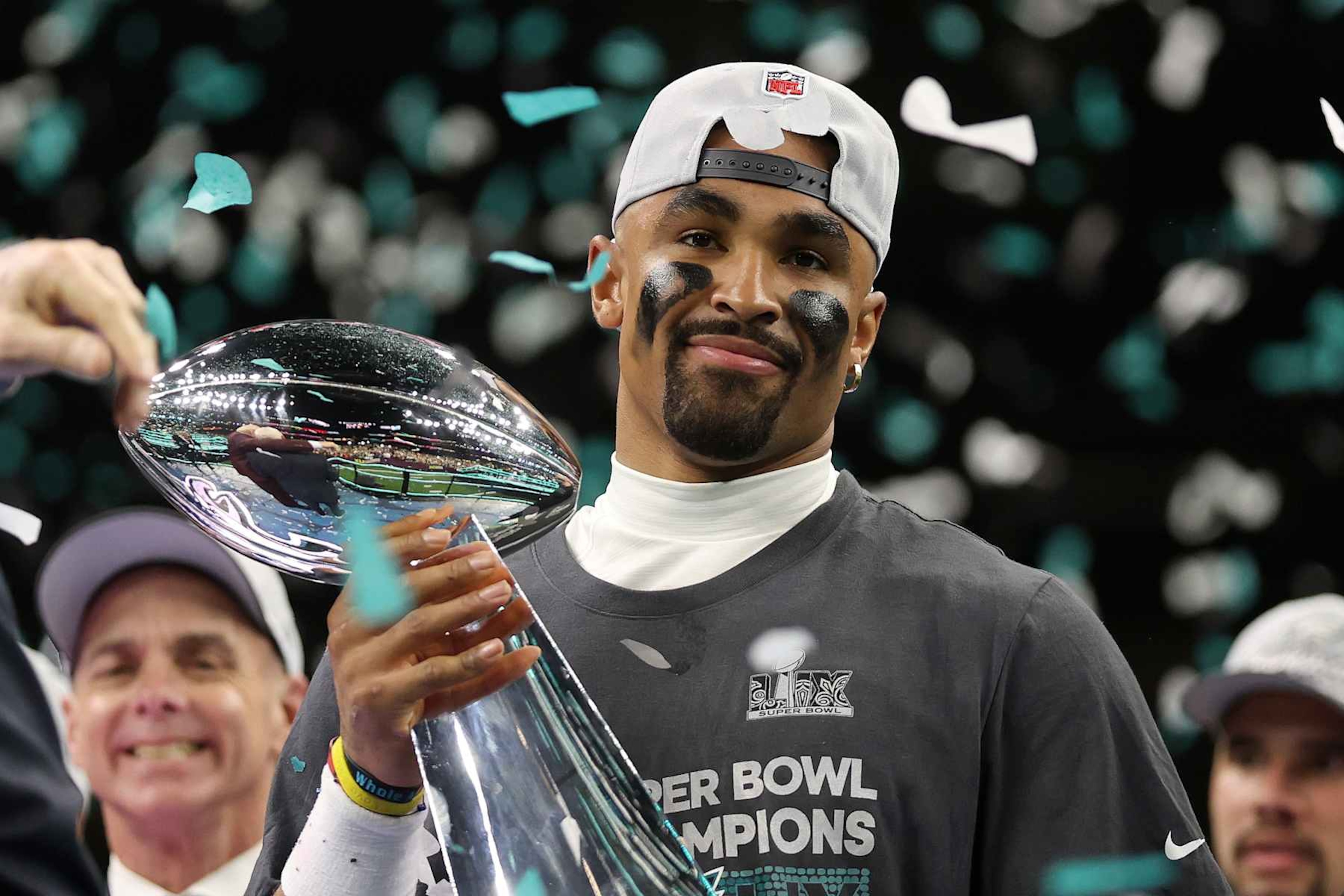 NEW ORLEANS, LOUISIANA - FEBRUARY 09: Jalen Hurts #1 of the Philadelphia Eagles celebrates with the Vince Lombardi Trophy after defeating the Kansas City Chiefs 40-22 to win Super Bowl LIX at Caesars Superdome on February 09, 2025 in New Orleans, Louisiana. (Photo by Jamie Squire/Getty Images) NEW ORLEANS, LOUISIANA - FEBRUARY 09: Jalen Hurts #1 of the Philadelphia Eagles celebrates with the Vince Lombardi Trophy after defeating the Kansas City Chiefs 40-22 to win Super Bowl LIX at Caesars Superdome on February 09, 2025 in New Orleans, Louisiana. (Photo by Jamie Squire/Getty Images)