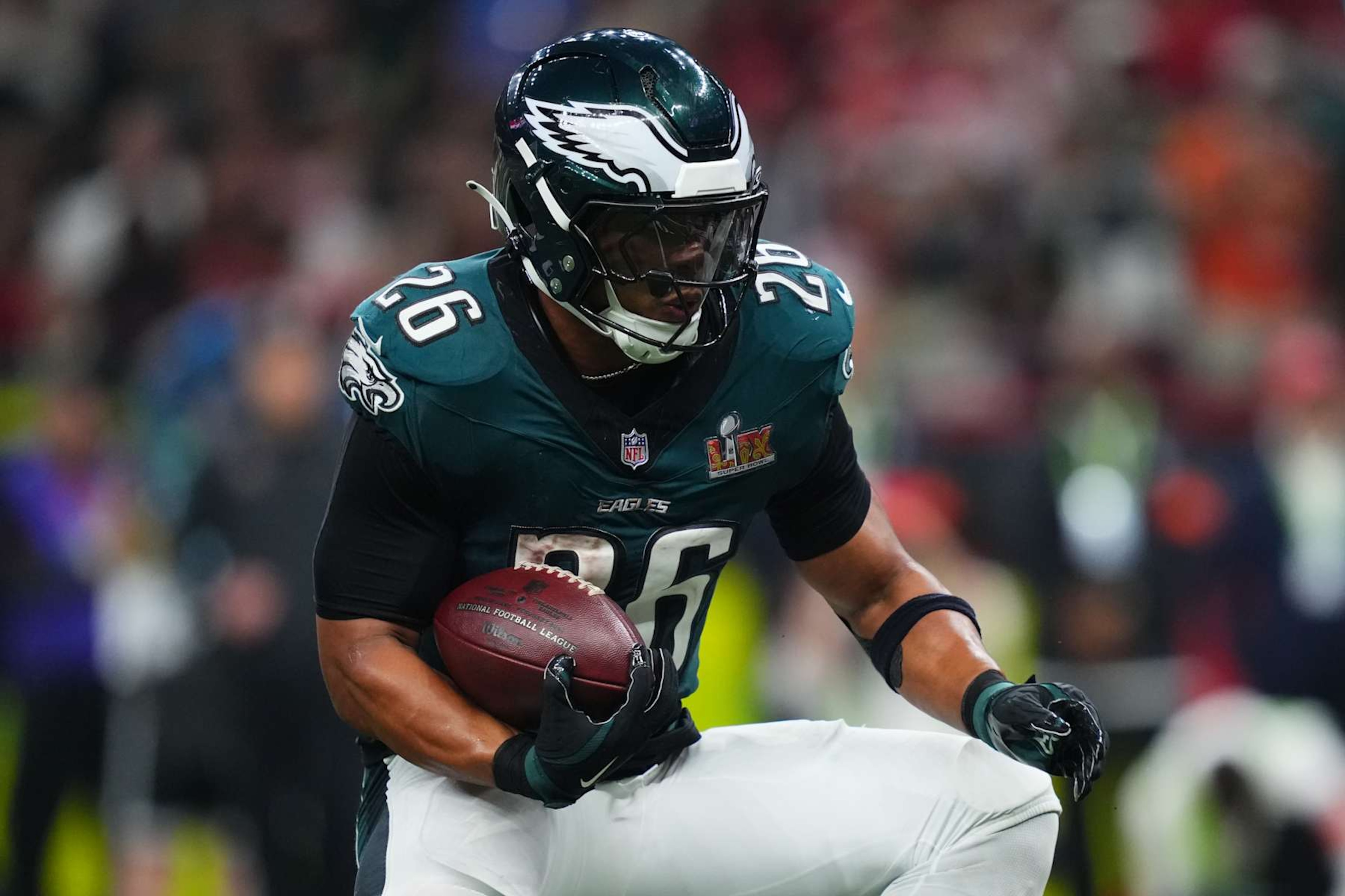 NEW ORLEANS, LA - FEBRUARY 09: Saquon Barkley #26 of the Philadelphia Eagles carries the ball against the Kansas City Chiefs during Super Bowl LIX at Caesars Superdome on February 9, 2025 in New Orleans, Louisiana. (Photo by Cooper Neill/Getty Images)