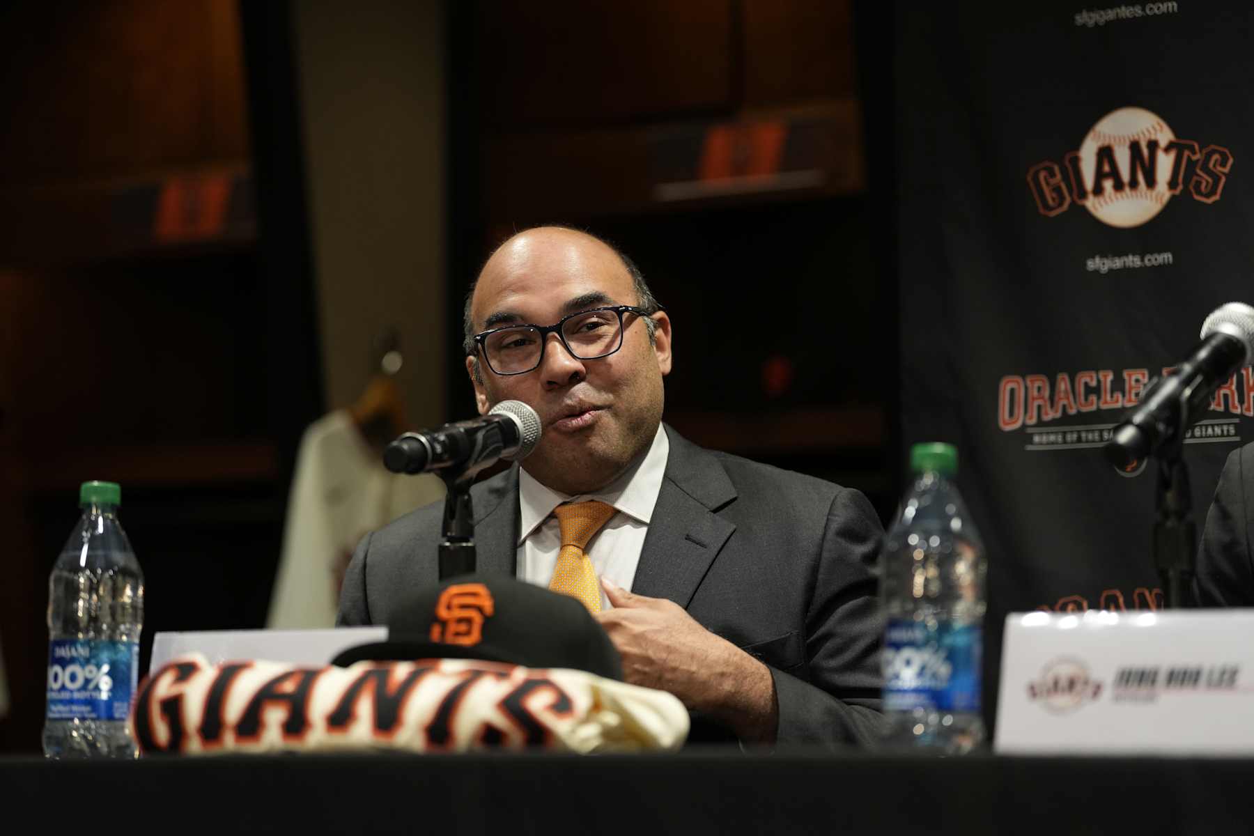 SAN FRANCISCO, CALIFORNIA - DECEMBER 15: Farhan Zaidi and Jung Hoo Lee (51) of the San Francisco Giants hold a press conference to introduce Lee's contract with the San Francisco Giants on December 15, 2023 in San Francisco, California. (Photo by Andy Kuno/San Francisco Giants/Getty Images)