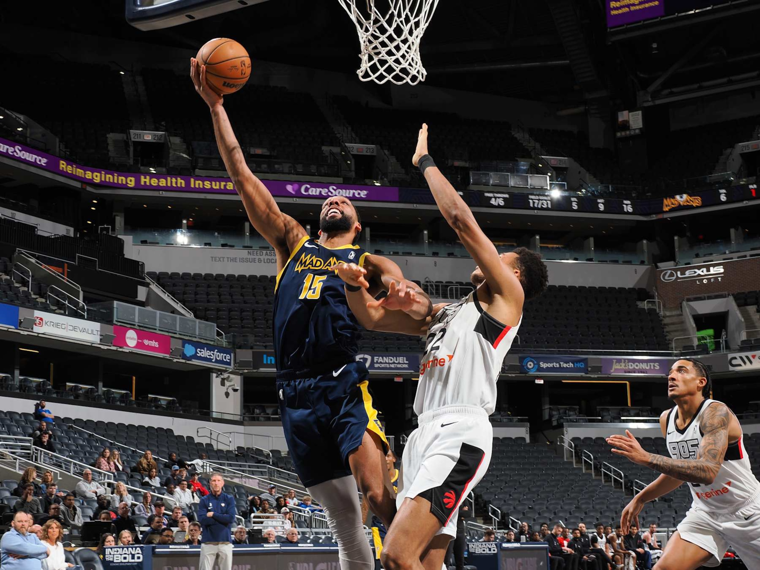 INDIANAPOLIS, IN - FEBRUARY 4: Jahill Okafor #15 of the Indiana Mad Ants shoots over Ulrich Chomche  #22 of the Raptors 905 on February 4, 2025 at Gainbridge Fieldhouse in Indianapolis, Indiana. NOTE TO USER: User expressly acknowledges and agrees that, by downloading and or using this photograph, User is consenting to the terms and conditions of the Getty Images License Agreement. Mandatory Copyright Notice: Copyright 2025 NBAE  (Photo by Ron Hoskins/NBAE via Getty Images)