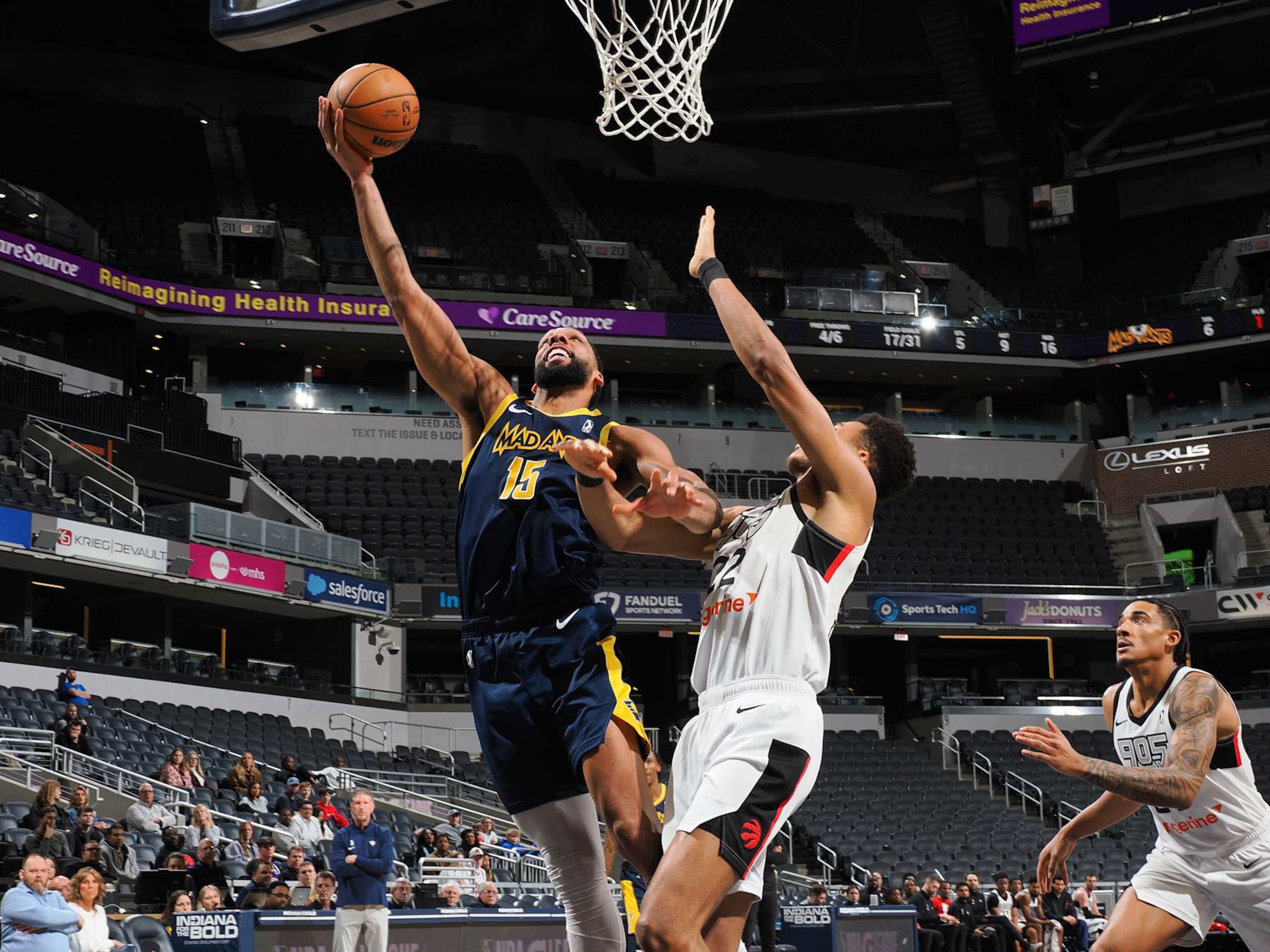 INDIANAPOLIS, IN - FEBRUARY 4: Jahill Okafor #15 of the Indiana Mad Ants shoots over Ulrich Chomche #22 of the Raptors 905 on February 4, 2025 at Gainbridge Fieldhouse in Indianapolis, Indiana. NOTE TO USER: User expressly acknowledges and agrees that, by downloading and or using this photograph, User is consenting to the terms and conditions of the Getty Images License Agreement. Mandatory Copyright Notice: Copyright 2025 NBAE (Photo by Ron Hoskins/NBAE via Getty Images) INDIANAPOLIS, IN - FEBRUARY 4: Jahill Okafor #15 of the Indiana Mad Ants shoots over Ulrich Chomche #22 of the Raptors 905 on February 4, 2025 at Gainbridge Fieldhouse in Indianapolis, Indiana. NOTE TO USER: User expressly acknowledges and agrees that, by downloading and or using this photograph, User is consenting to the terms and conditions of the Getty Images License Agreement. Mandatory Copyright Notice: Copyright 2025 NBAE (Photo by Ron Hoskins/NBAE via Getty Images)