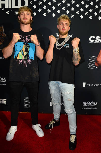 MIAMI BEACH, FL - APRIL 18:  Logan Paul and Jake Paul attend Jake Paul afterparty hosted by Celebrity Sports Entertainment (CSE) at The Villa Casa Casuarina At The Former Versace Mansion on April 18, 2021 in Miami Beach, Florida.  Jake Paul made an appearance to his afterparty to celebrate his win after defeating Ben Askren in a first round TKO bout yesterday inside Mercedes-Benz Stadium in Atlanta.    (Photo by Johnny Louis/Getty Images)