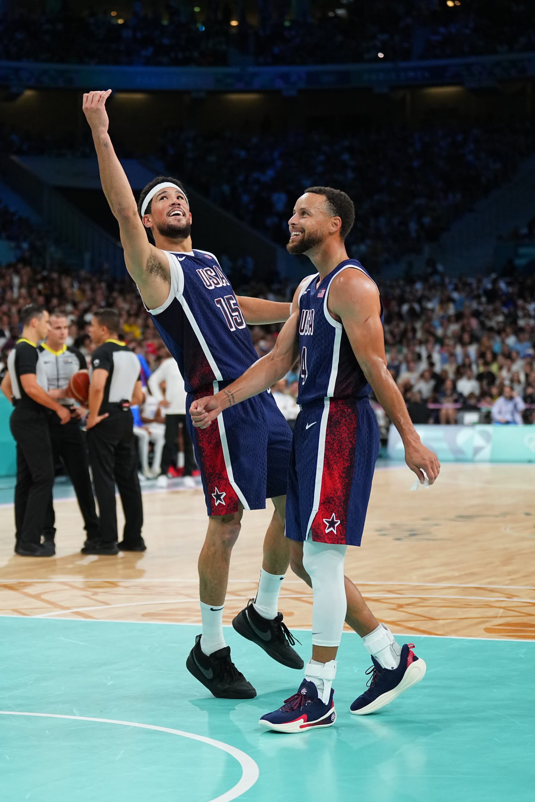 Devin Booker and Stephen Curry with Team USA