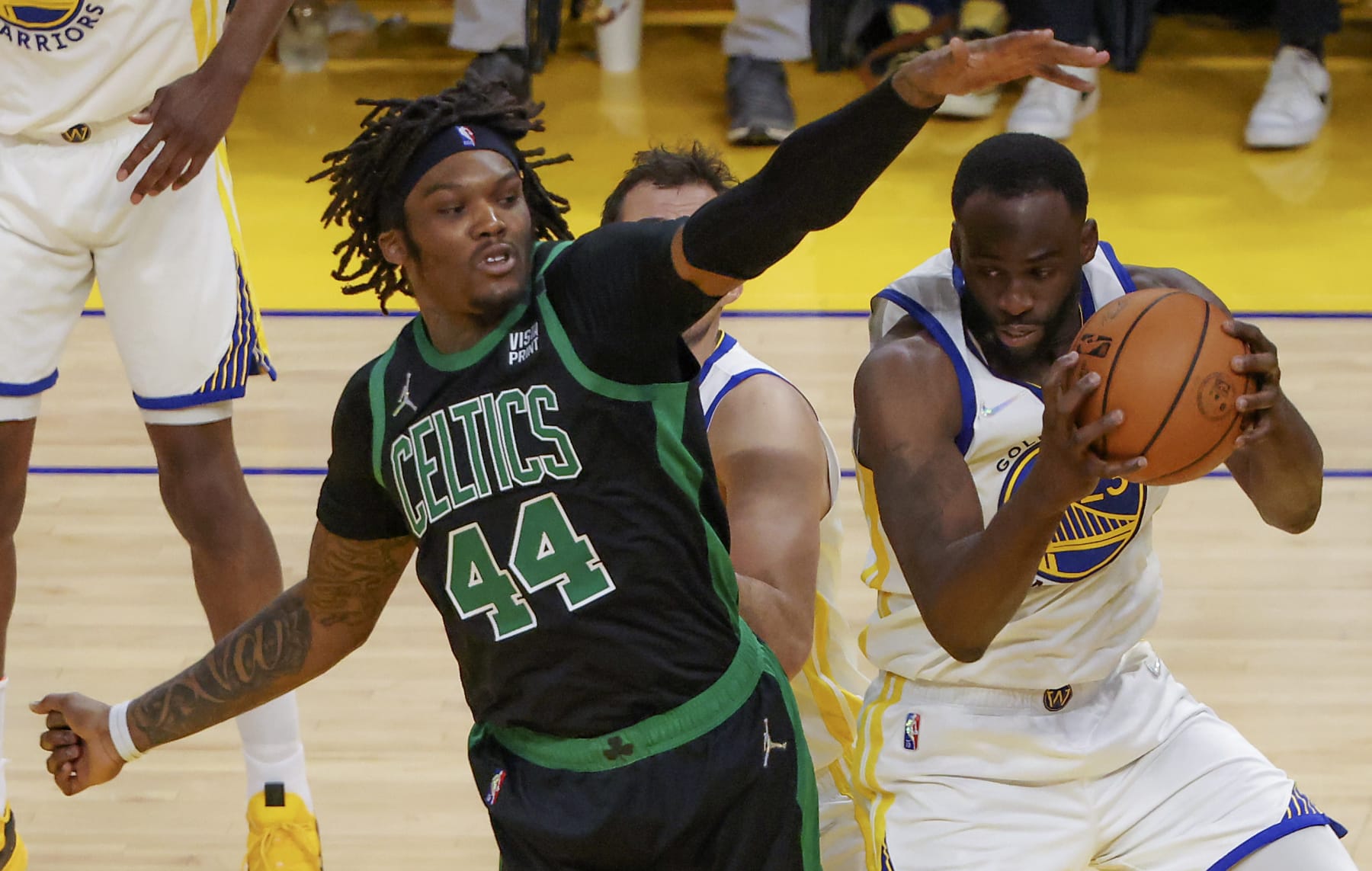 San Francisco - June 13: Golden State Warriors forward Draymond Green (23) grabs a defensive rebound in front of Boston Celtics center Robert Williams III (44) during second quarter action. The Boston Celtics visited the Golden State Warriors for Game Five of the NBA Finals at the Chase Center in San Francisco, CA on June 13, 2022. (Photo by Matthew J. Lee/The Boston Globe via Getty Images)