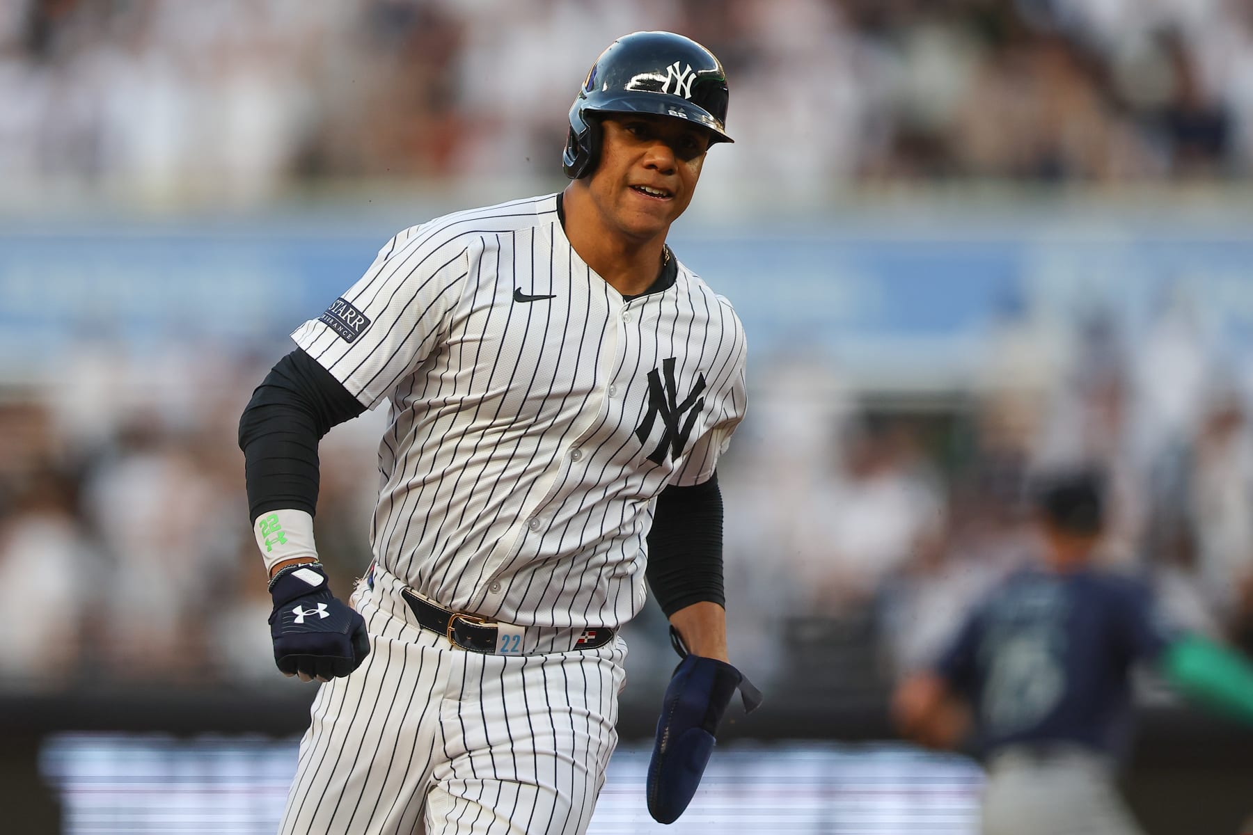 BRONX, NY - MAY 20: Juan Soto #22 of the New York Yankees runs to third base during the game against the Seattle Mariners on May 20, 2024 at Yankee Stadium in the Bronx, New York.  (Photo by Rich Graessle/Icon Sportswire via Getty Images)