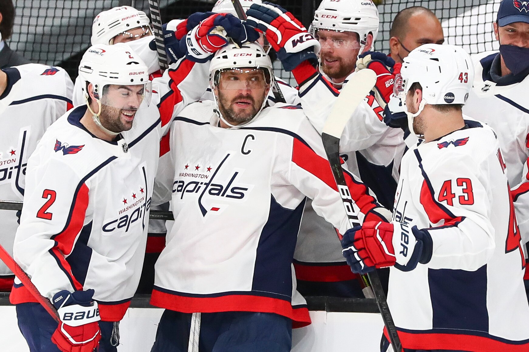 BOSTON, MA - MAY 19: Alex Ovechkin #8 of the Washington Capitals reacts with teammates after scoring in the second period in Game Three of the First Round of the 2021 Stanley Cup Playoffs against the Boston Bruins at TD Garden on May 19, 2021 in Boston, Massachusetts. (Photo by Adam Glanzman/Getty Images)