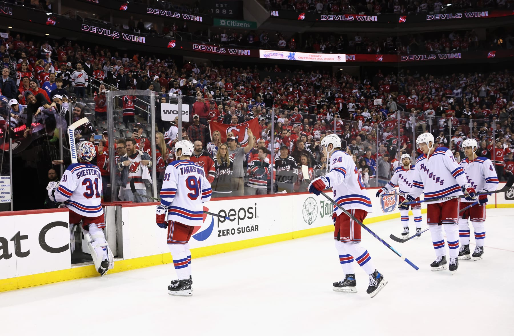 NEWARK, NEW JERSEY - MAY 01: The New York Rangers leave the ice following a series losing loss to the New Jersey Devils in Game Seven of the First Round of the 2023 Stanley Cup Playoffs at Prudential Center on May 01, 2023 in Newark, New Jersey. (Photo by Bruce Bennett/Getty Images)