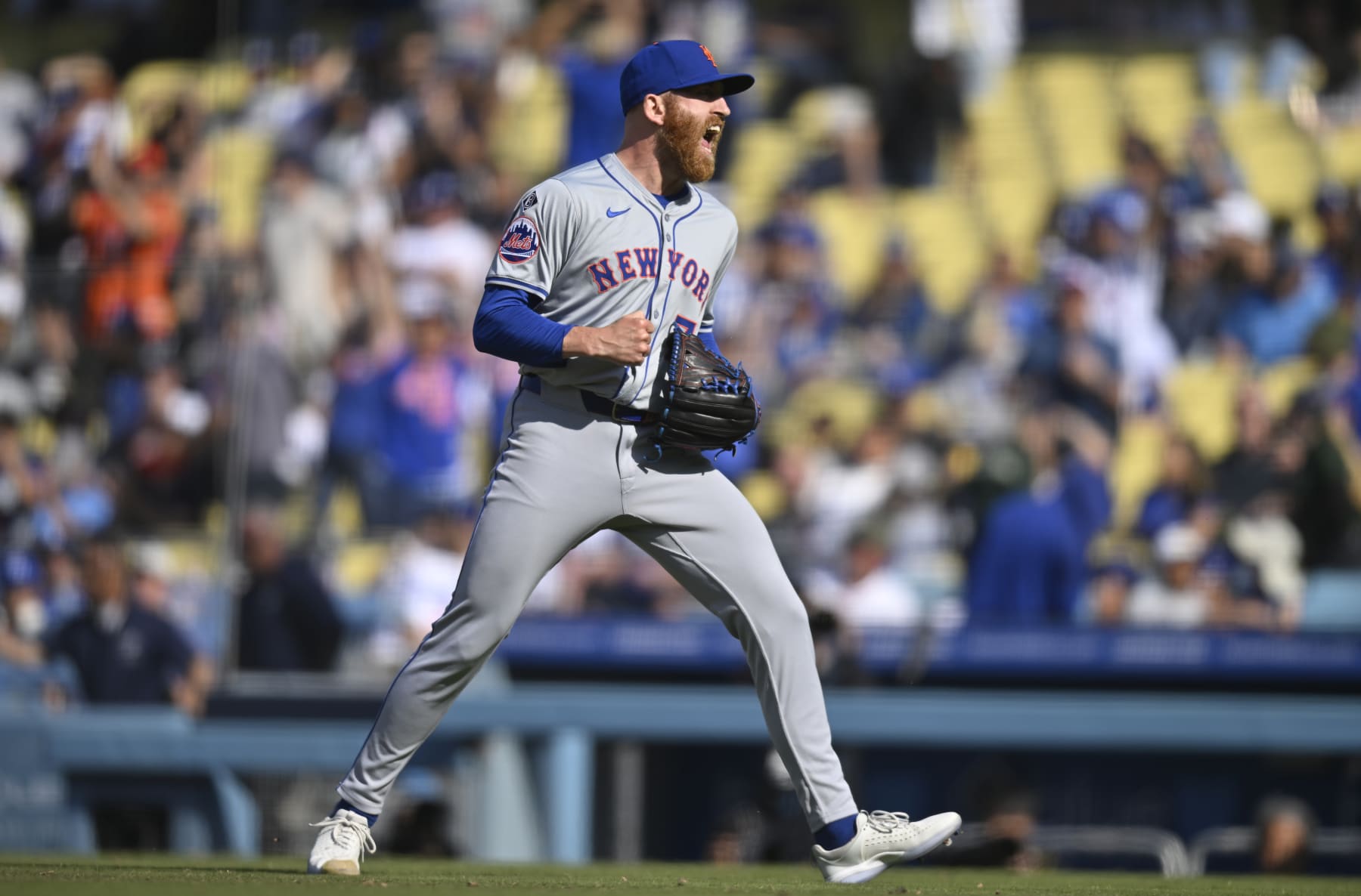 LOS ANGELES, CALIFORNIA - APRIL 20: Reed Garrett #75 of the New York Mets reacts after striking out Gavin Lux #9 of the Los Angeles Dodgers for the last out in a 6-4 win over the Dodgers at Dodger Stadium on April 20, 2024 in Los Angeles, California. (Photo by John McCoy/Getty Images)