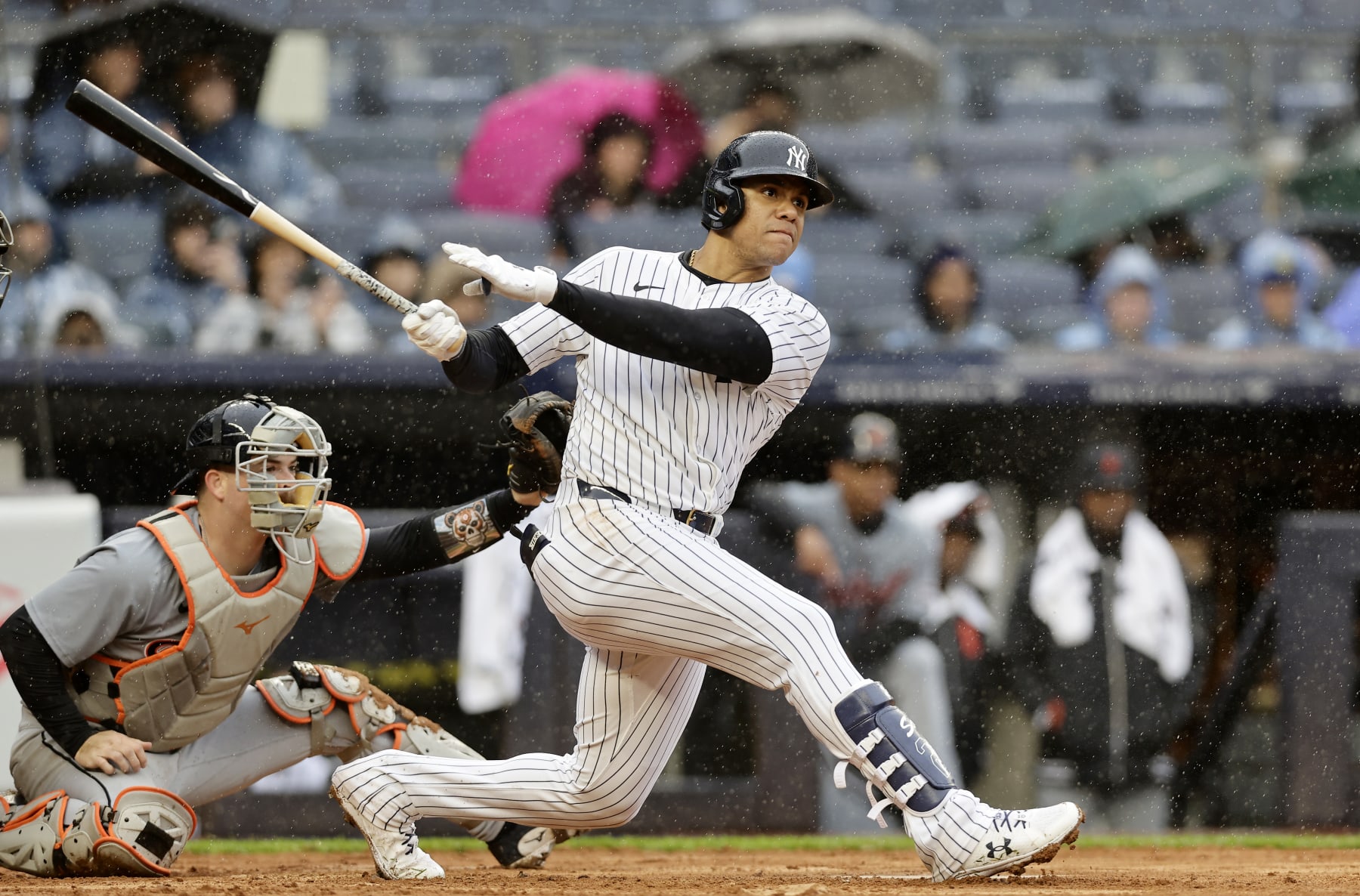 NEW YORK, NEW YORK - MAY 05:  Juan Soto #22 of the New York Yankees follows through on his seventh inning three run double against the Detroit Tigers at Yankee Stadium on May 05, 2024 in New York City. (Photo by Jim McIsaac/Getty Images)