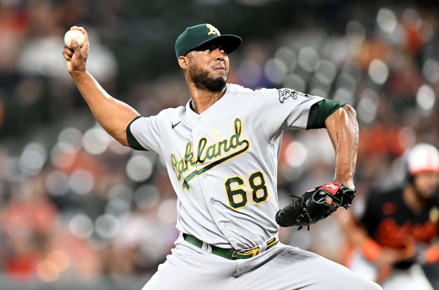 BALTIMORE, MARYLAND - SEPTEMBER 02: Domingo Acevedo #68 of the Oakland Athletics pitches against the Baltimore Orioles at Oriole Park at Camden Yards on September 02, 2022 in Baltimore, Maryland. (Photo by G Fiume/Getty Images)
