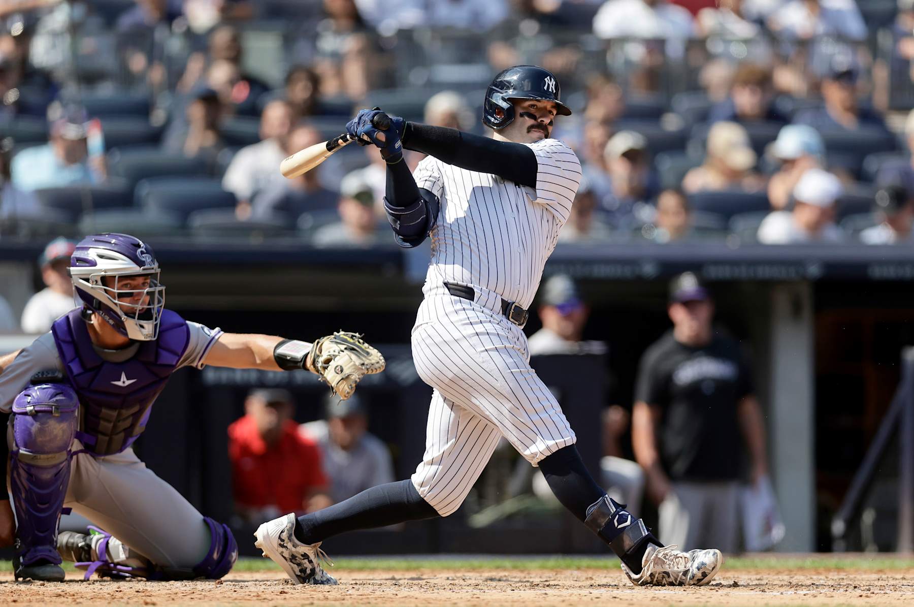 NEW YORK, NEW YORK - AUGUST 24:  Austin Wells #28 of the New York Yankees in action against the Colorado Rockies at Yankee Stadium on August 24, 2024 in New York City. The Rockies defeated the Yankees 9-2. (Photo by Jim McIsaac/Getty Images)
