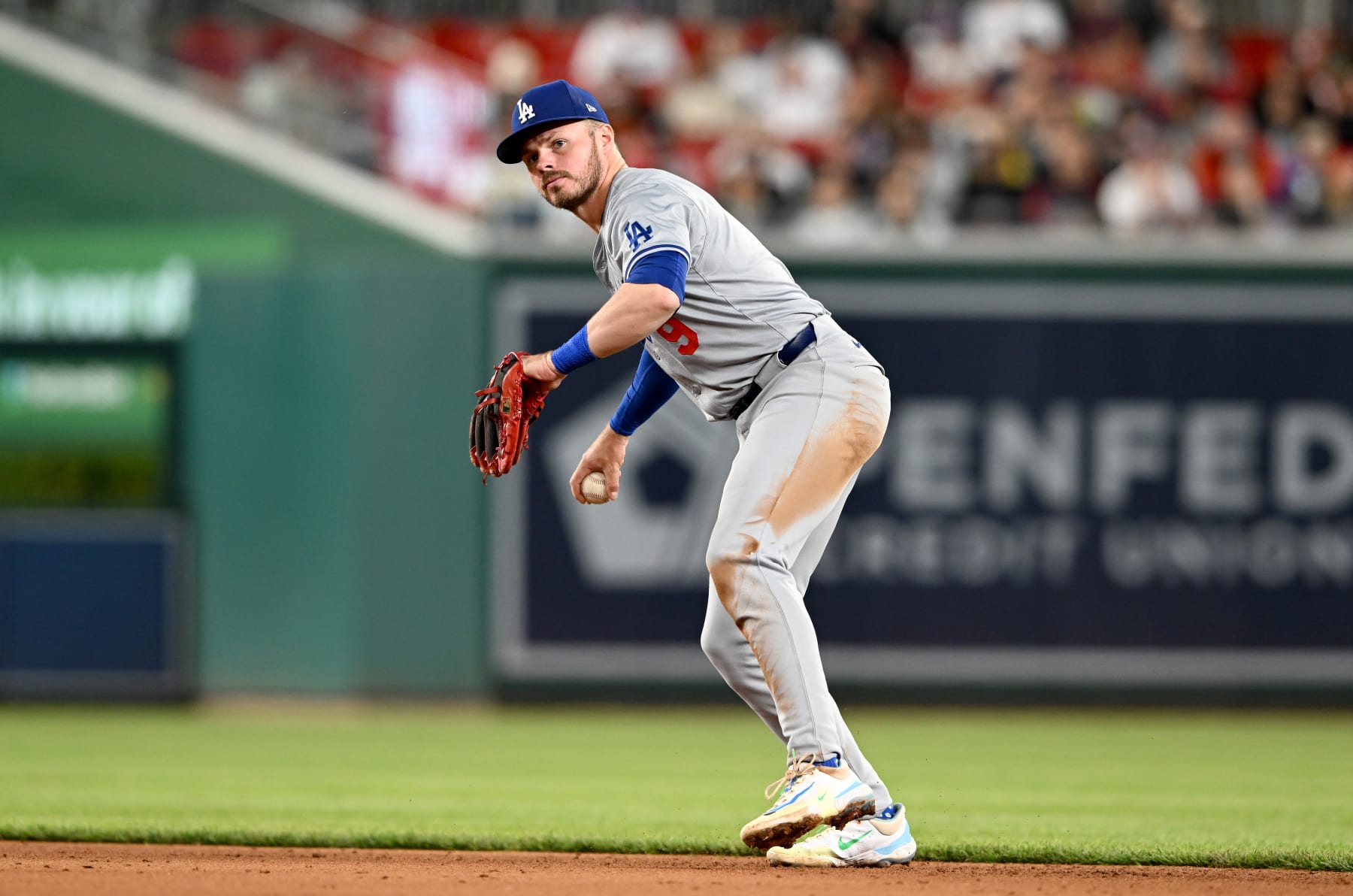 WASHINGTON, DC - APRIL 24: Gavin Lux #9 of the Los Angeles Dodgers throws the ball to first base against the Washington Nationals at Nationals Park on April 24, 2024 in Washington, DC. (Photo by G Fiume/Getty Images)