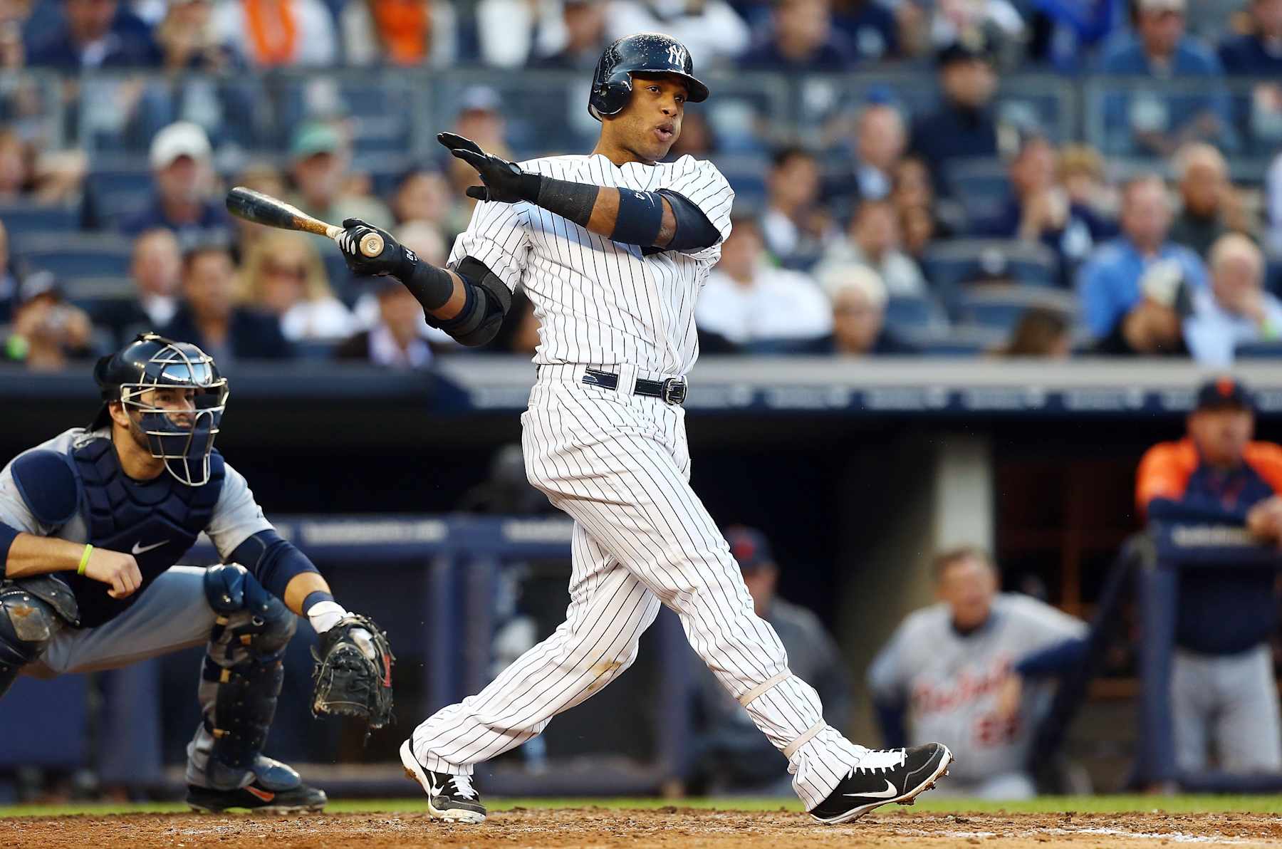 NEW YORK, NY - OCTOBER 14:  (NEW YORK DAILIES OUT)   Robinson Cano #24 of the New York Yankees in action against the Detroit Tigers during Game Two of the American League Championship Series at Yankee Stadium on October 14, 2012 in the Bronx borough of New York City, New York.. The Tigers defeated the Yankees 3-0.  (Photo by Jim McIsaac/Getty Images) 