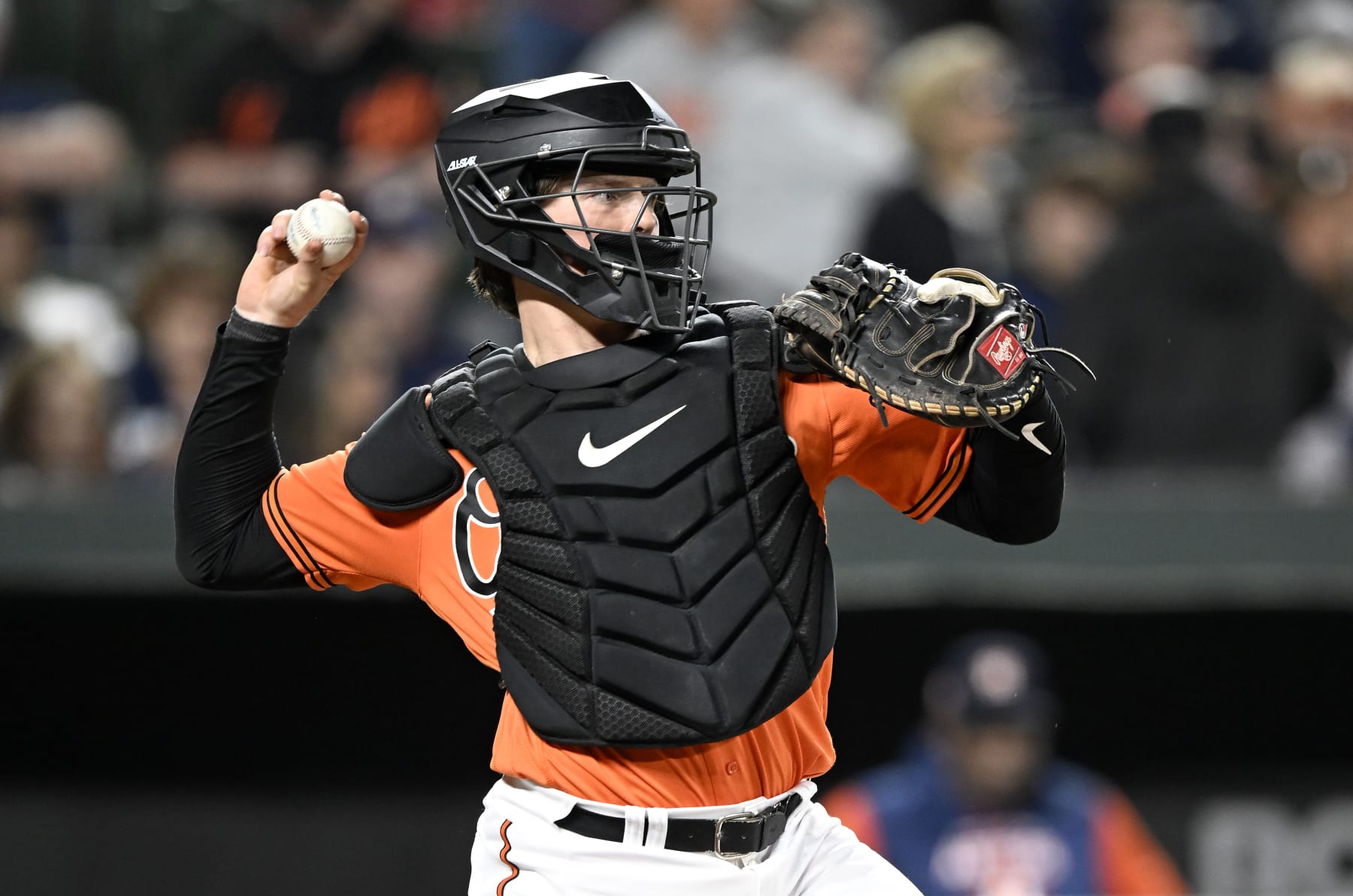 BALTIMORE, MARYLAND - SEPTEMBER 24: Adley Rutschman #35 of the Baltimore Orioles throws the ball to second base against the Houston Astros at Oriole Park at Camden Yards on September 24, 2022 in Baltimore, Maryland. (Photo by G Fiume/Getty Images)