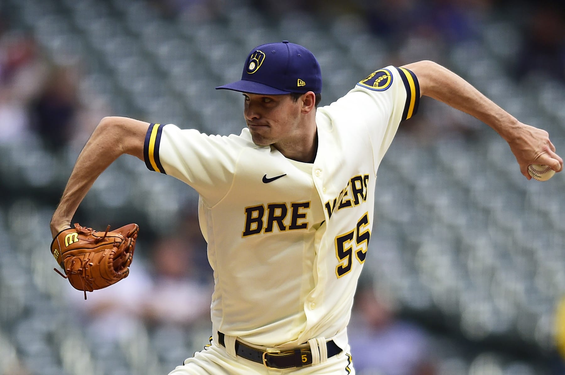 MILWAUKEE, WISCONSIN - OCTOBER 05: Hoby Milner #55 of the Milwaukee Brewers throws a pitch during the seventh inning against the Arizona Diamondbacks at American Family Field on October 05, 2022 in Milwaukee, Wisconsin. (Photo by Kayla Wolf/Getty Images)