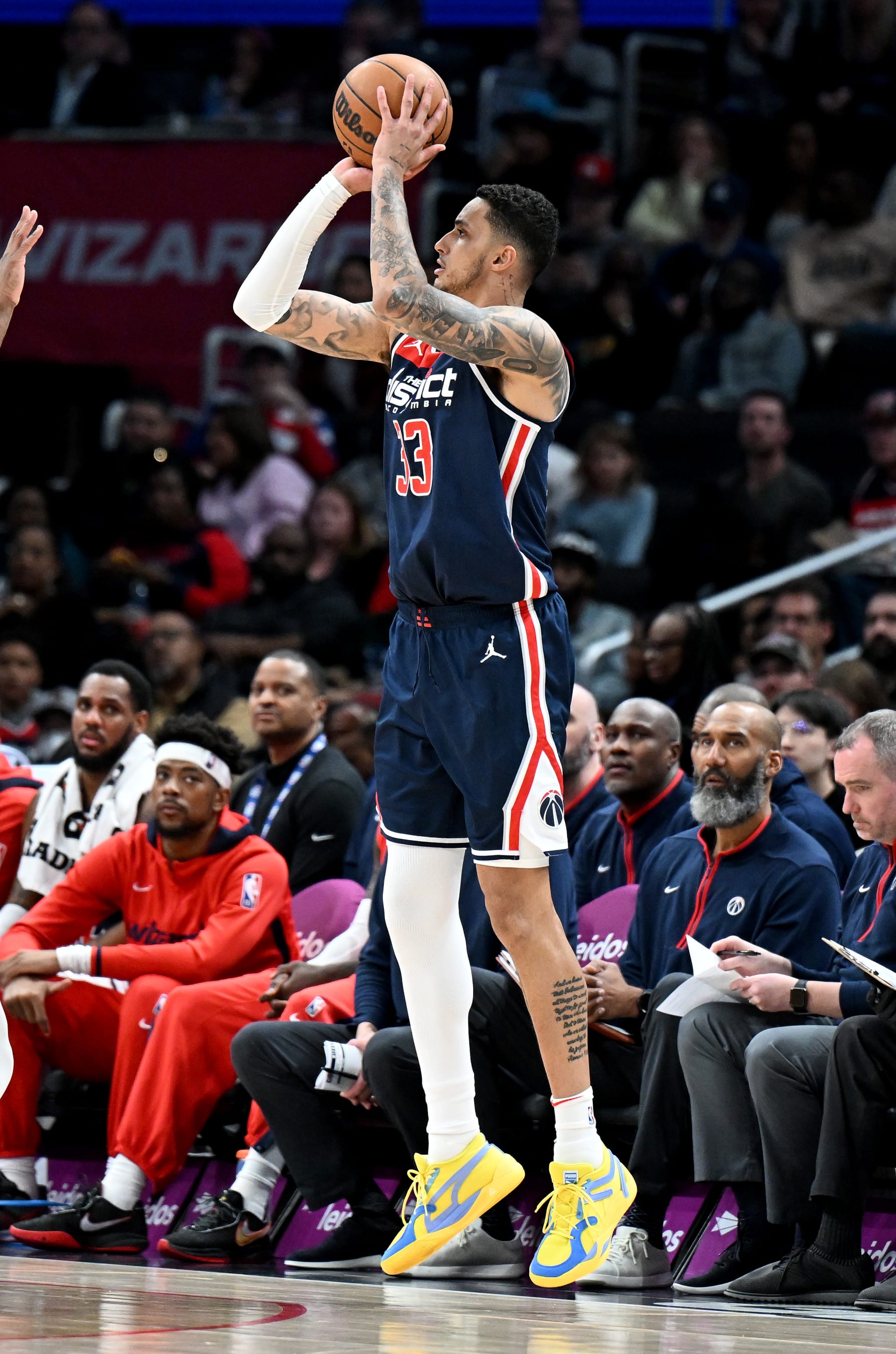 WASHINGTON, DC - MARCH 18: Kyle Kuzma #33 of the Washington Wizards shoots the ball against the Sacramento Kings at Capital One Arena on March 18, 2023 in Washington, DC.  NOTE TO USER: User expressly acknowledges and agrees that, by downloading and or using this photograph, User is consenting to the terms and conditions of the Getty Images License Agreement.  (Photo by G Fiume/Getty Images)