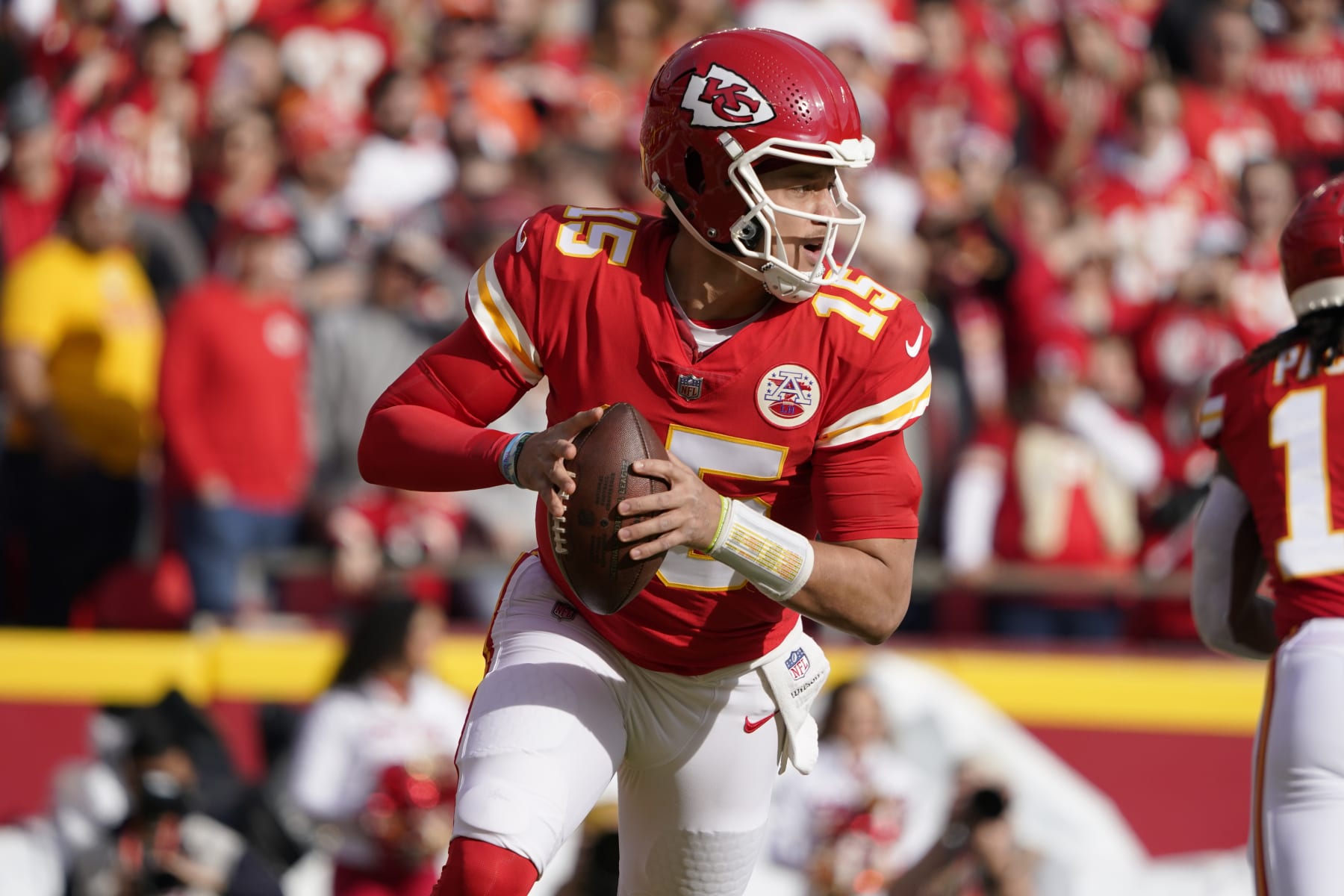 Kansas City Chiefs quarterback Patrick Mahomes looks to pass against the Denver Broncos during an NFL football game Sunday, Jan. 1, 2023, in Kansas City, Mo. (AP Photo/Ed Zurga)
