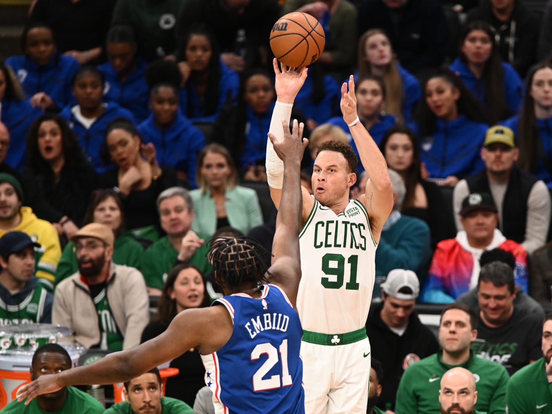 BOSTON, MASSACHUSETTS - FEBRUARY 08: Blake Griffin #91 of the Boston Celtics attempts a three-point basket past Joel Embiid #21 of the Philadelphia 76ers during the second quarter at the TD Garden on February 08, 2023 in Boston, Massachusetts. NOTE TO USER: User expressly acknowledges and agrees that, by downloading and or using this photograph, User is consenting to the terms and conditions of the Getty Images License Agreement.  (Photo by Brian Fluharty/Getty Images)