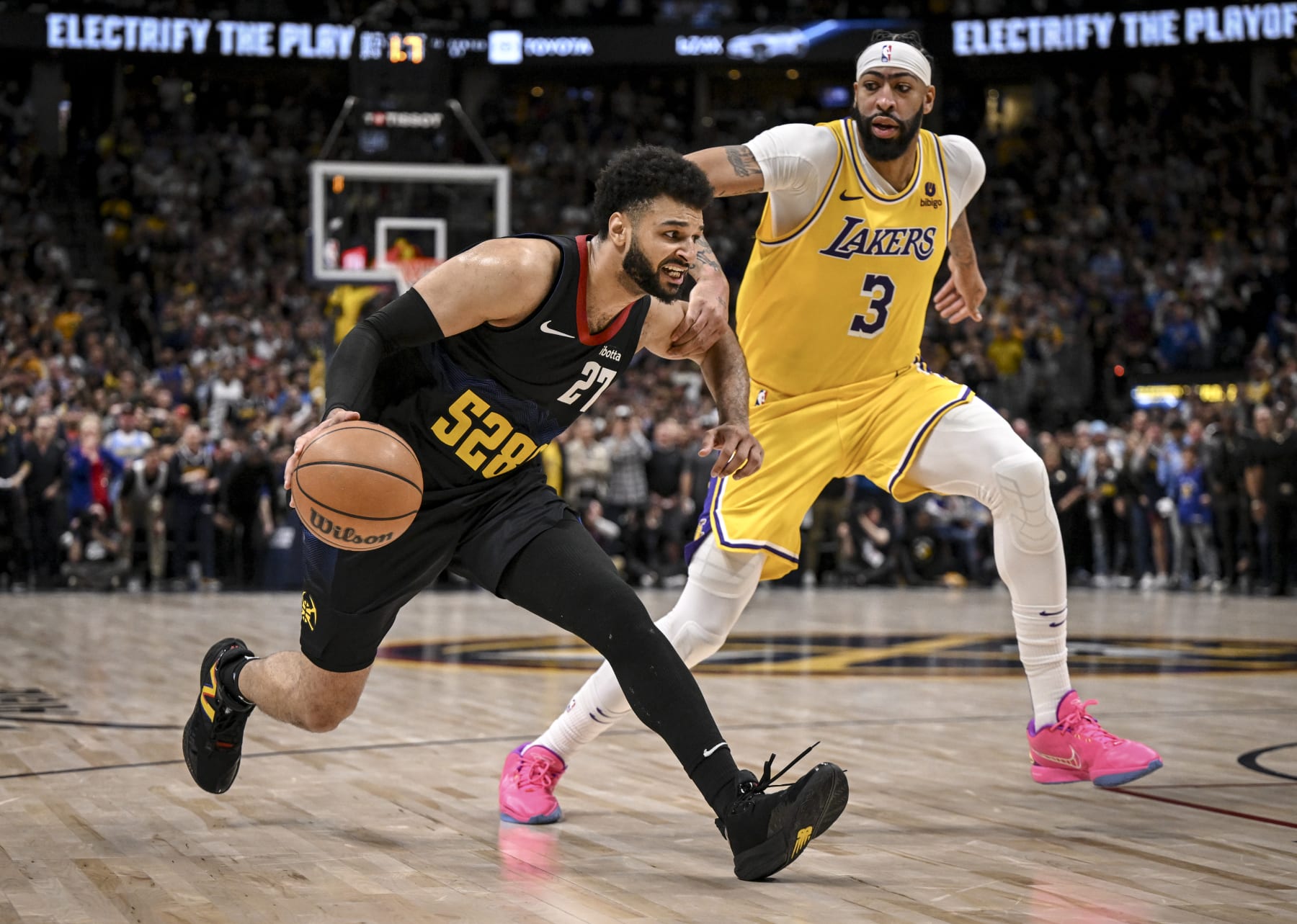 DENVER, CO - APRIL 22: Jamal Murray (27) of the Denver Nuggets takes a step before stepping back and hitting the game-winning shot over Anthony Davis (3) of the Los Angeles Lakers during the fourth quarter of the Nuggets' 101-99 win at Ball Arena in Denver on Monday, April 22, 2024. (Photo by AAron Ontiveroz/The Denver Post)