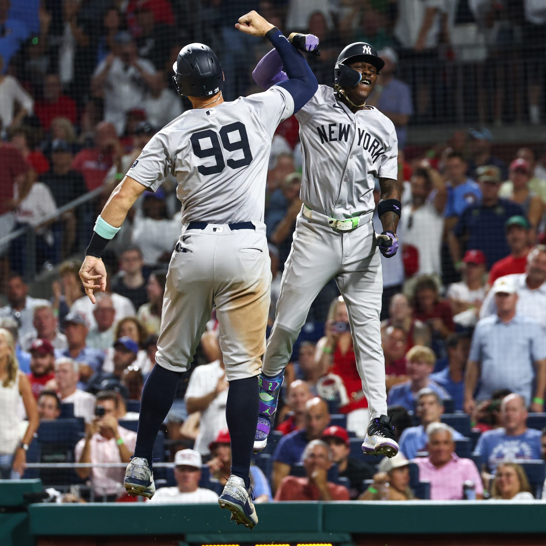 PHILADELPHIA, PENNSYLVANIA - JULY 30: Jazz Chisholm Jr. #13 of the New York Yankees celebrates with Aaron Judge #99 after hitting a three-run home run against the Philadelphia Phillies in the seventh inning at Citizens Bank Park on July 30, 2024 in Philadelphia, Pennsylvania. (Photo by Heather Barry/Getty Images)