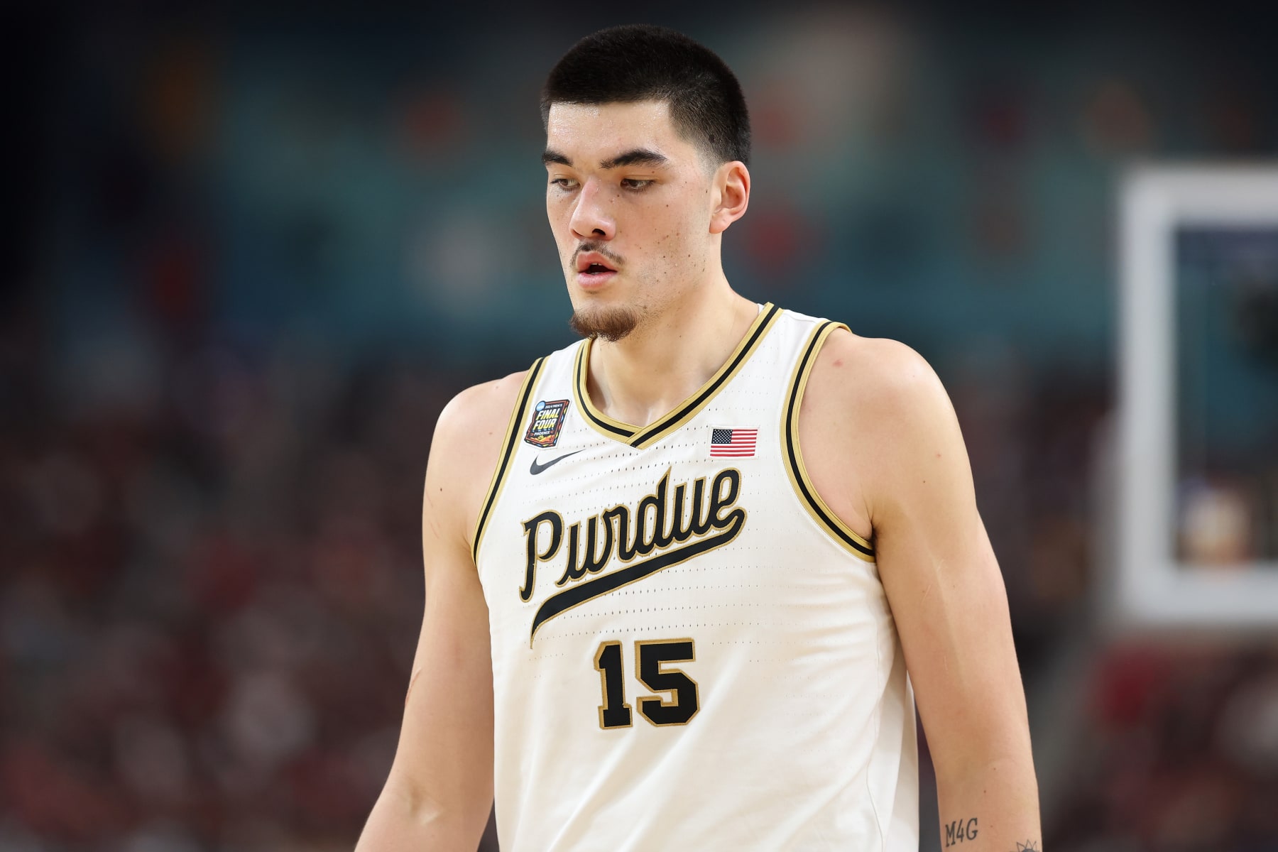 GLENDALE, ARIZONA - APRIL 06: Zach Edey #15 of the Purdue Boilermakers walks across the court in the first half against the North Carolina State Wolfpack  in the NCAA Men's Basketball Tournament Final Four semifinal game at State Farm Stadium on April 06, 2024 in Glendale, Arizona. (Photo by Christian Petersen/Getty Images)