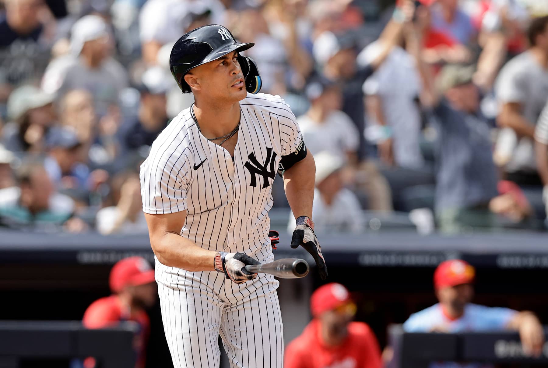 NEW YORK, NEW YORK - AUGUST 31: Giancarlo Stanton #27 of the New York Yankees watches his eighth inning pinch hit three-run double against the St. Louis Cardinals at Yankee Stadium on August 31, 2024 in New York City. (Photo by Jim McIsaac/Getty Images)