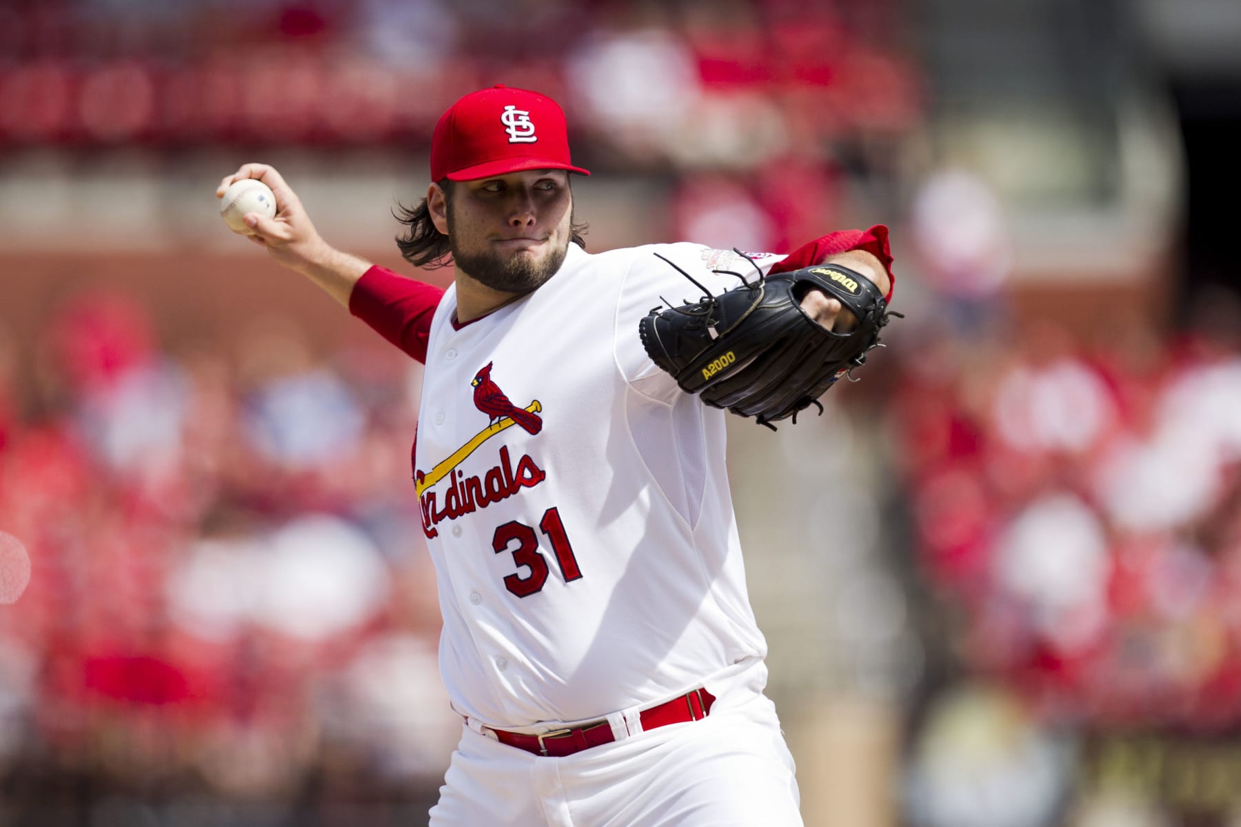 ST. LOUIS, MO - AUGUST 18: Lance Lynn #31 of the St. Louis Cardinals delivers a pitch during the game against the Pittsburgh Pirates at Busch Stadium on August 18, 2012 in St. Louis, Missouri. (Photo by David Welker/Getty Images)