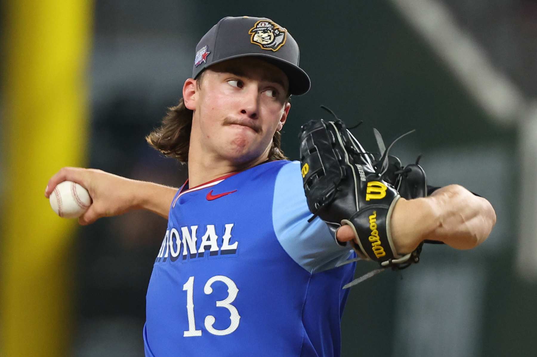 ARLINGTON, TEXAS - JULY 13: Bubba Chandler #13 of the Pittsburgh Pirates pitches during the seventh inning of the All-Star Futures Game at Globe Life Field on July 13, 2024 in Arlington, Texas.  (Photo by Richard Rodriguez/Getty Images)