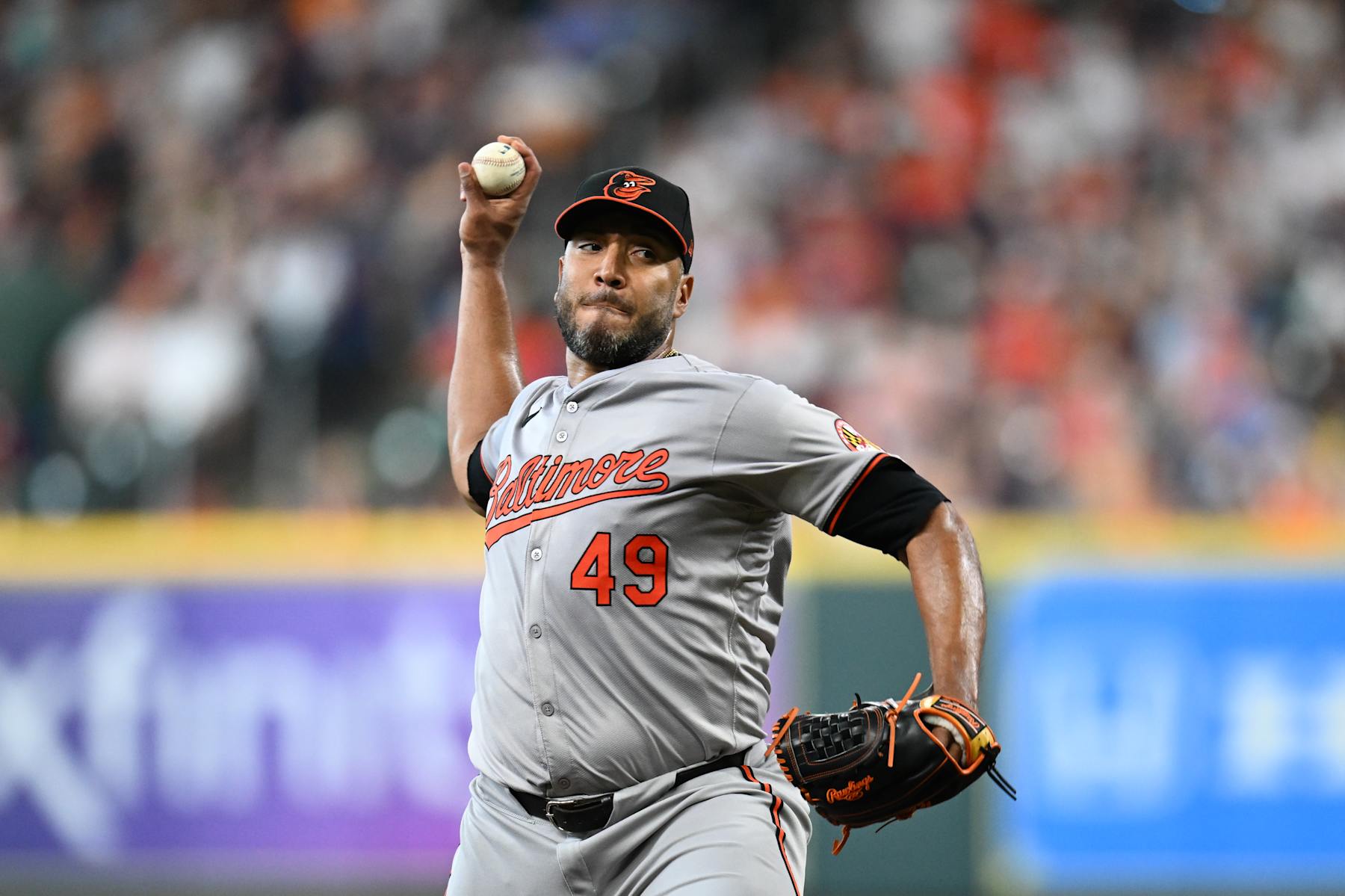 HOUSTON, TEXAS - JUNE 23: Albert Suarez #49 of the Baltimore Orioles pitches against the Houston Astros during the first inning at Minute Maid Park on June 23, 2024 in Houston, Texas. (Photo by Jack Gorman/Getty Images)