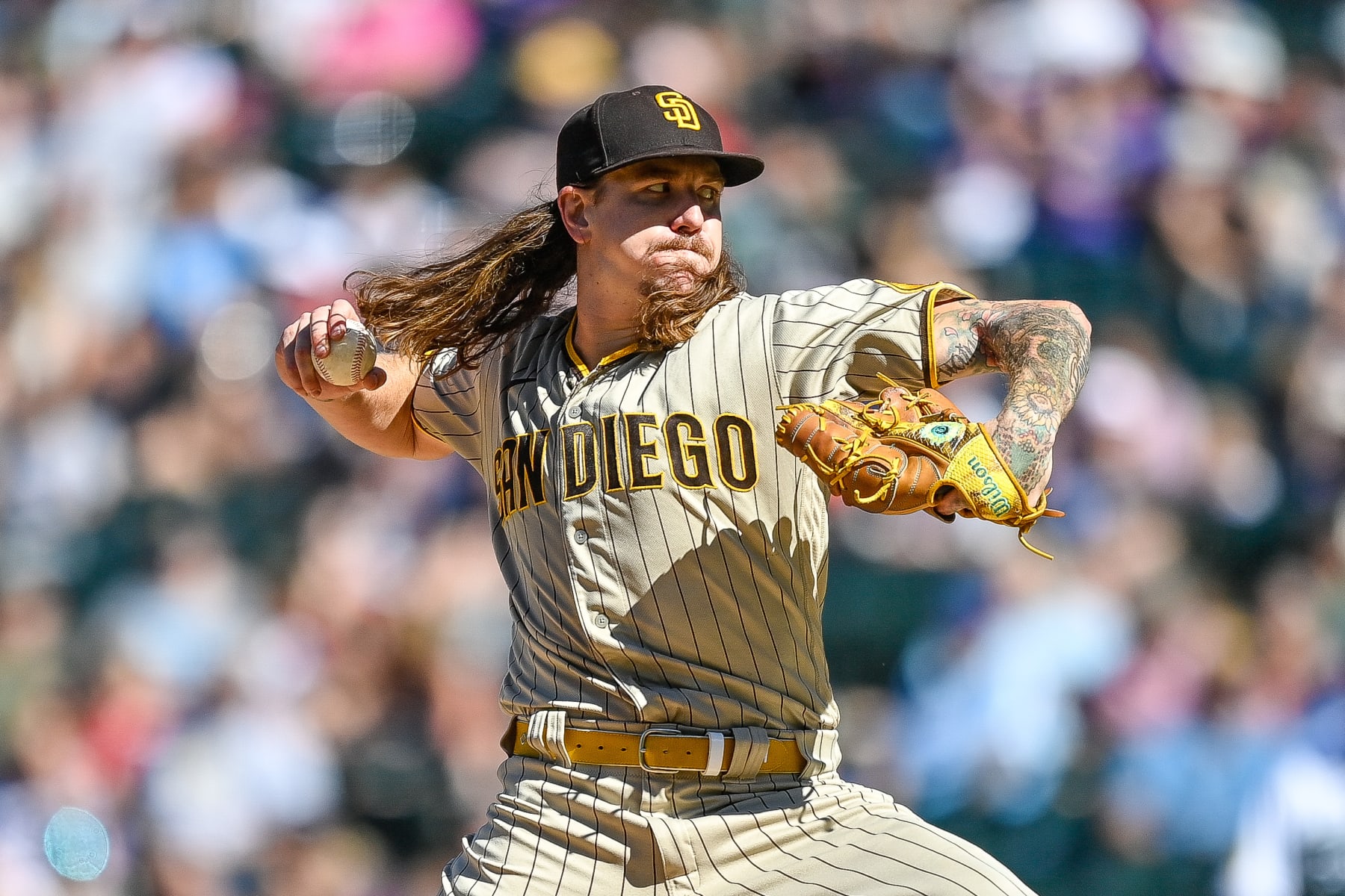 DENVER, CO - SEPTEMBER 25: Mike Clevinger #52 of the San Diego Padres pitches against the Colorado Rockies in the third inning of a game at Coors Field on September 25, 2022 in Denver, Colorado. (Photo by Dustin Bradford/Getty Images)