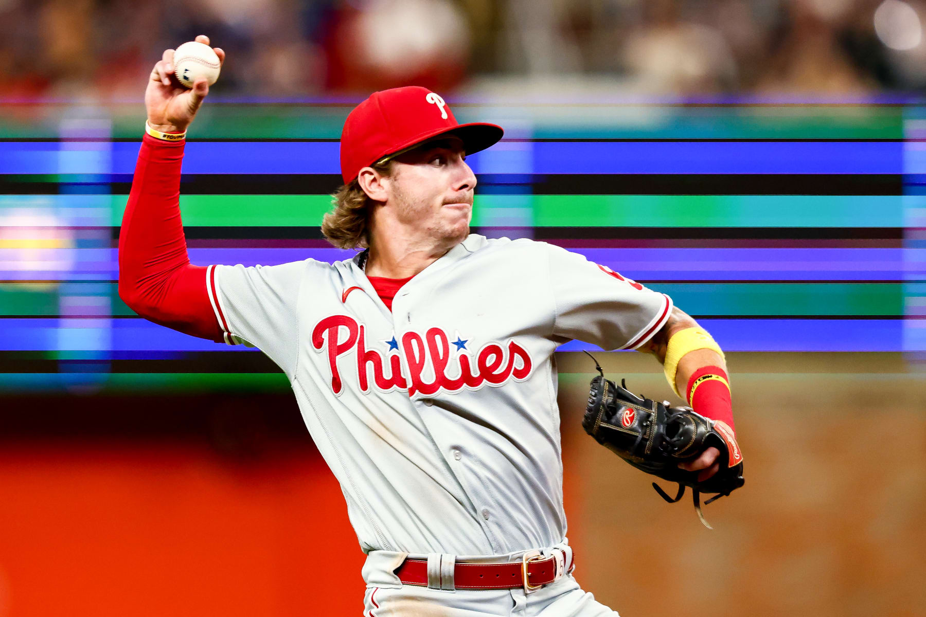 ATLANTA, GA - SEPTEMBER 16: Bryson Stott #5 of the Philadelphia Phillies throws to first after fielding a ball in the bottom of the seventh inning during a game against the Atlanta Braves at Truist Park on September 16, 2022 in Atlanta, Georgia. (Photo by Casey Sykes/Getty Images)