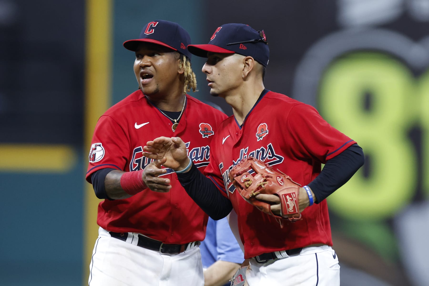 CLEVELAND, OH - MAY 30: Jose Ramirez #11 and Andres Gimenez #0 of the Cleveland Guardians celebrate a 7-3 win against the Kansas City Royals at Progressive Field on May 30, 2022 in Cleveland, Ohio. (Photo by Ron Schwane/Getty Images)