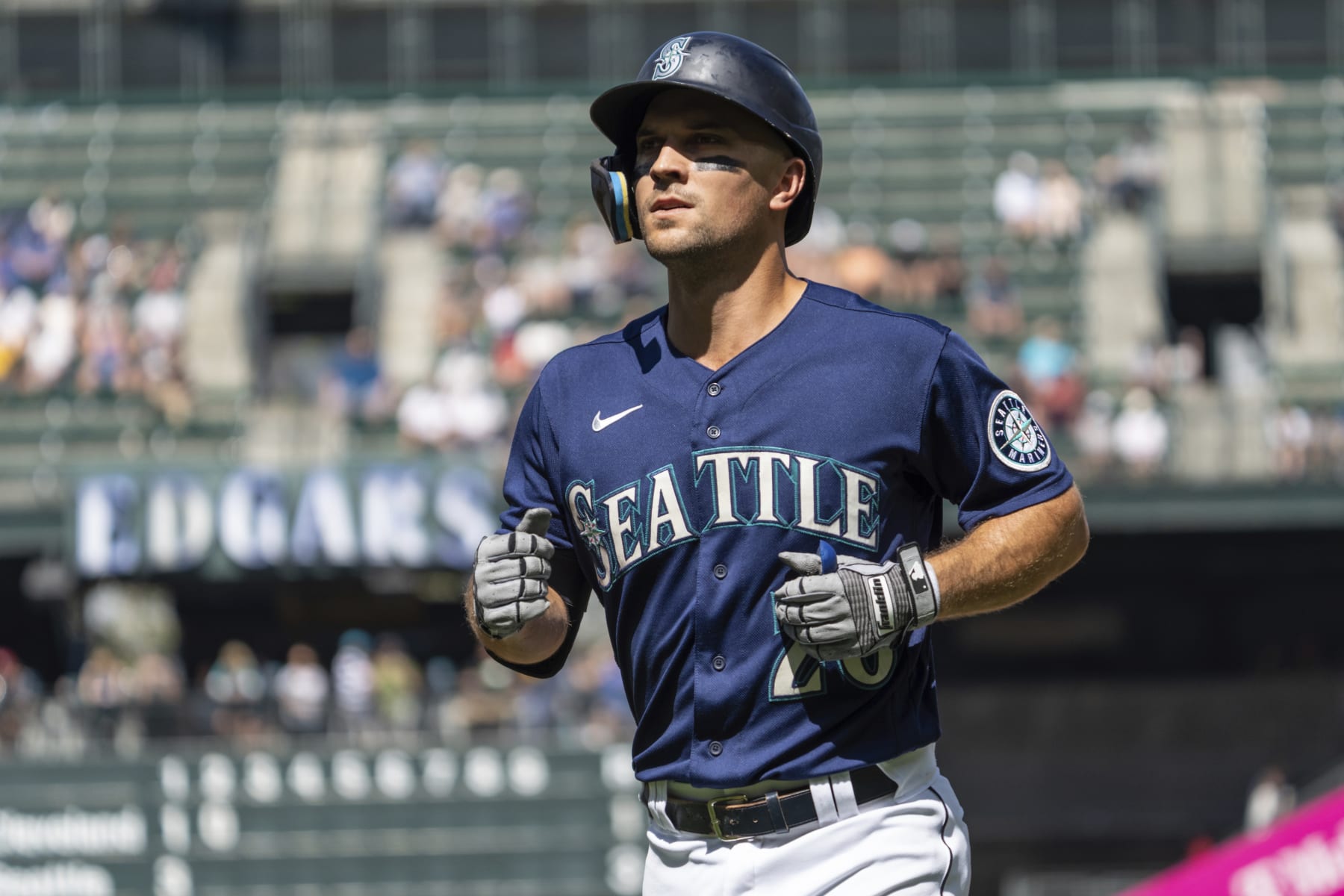 Seattle Mariners' Adam Frazier jogs off the field during a baseball game against the Cleveland Guardians, Thursday, Aug. 25, 2022, in Seattle. The Mariners won 3-1. (AP Photo/Stephen Brashear)