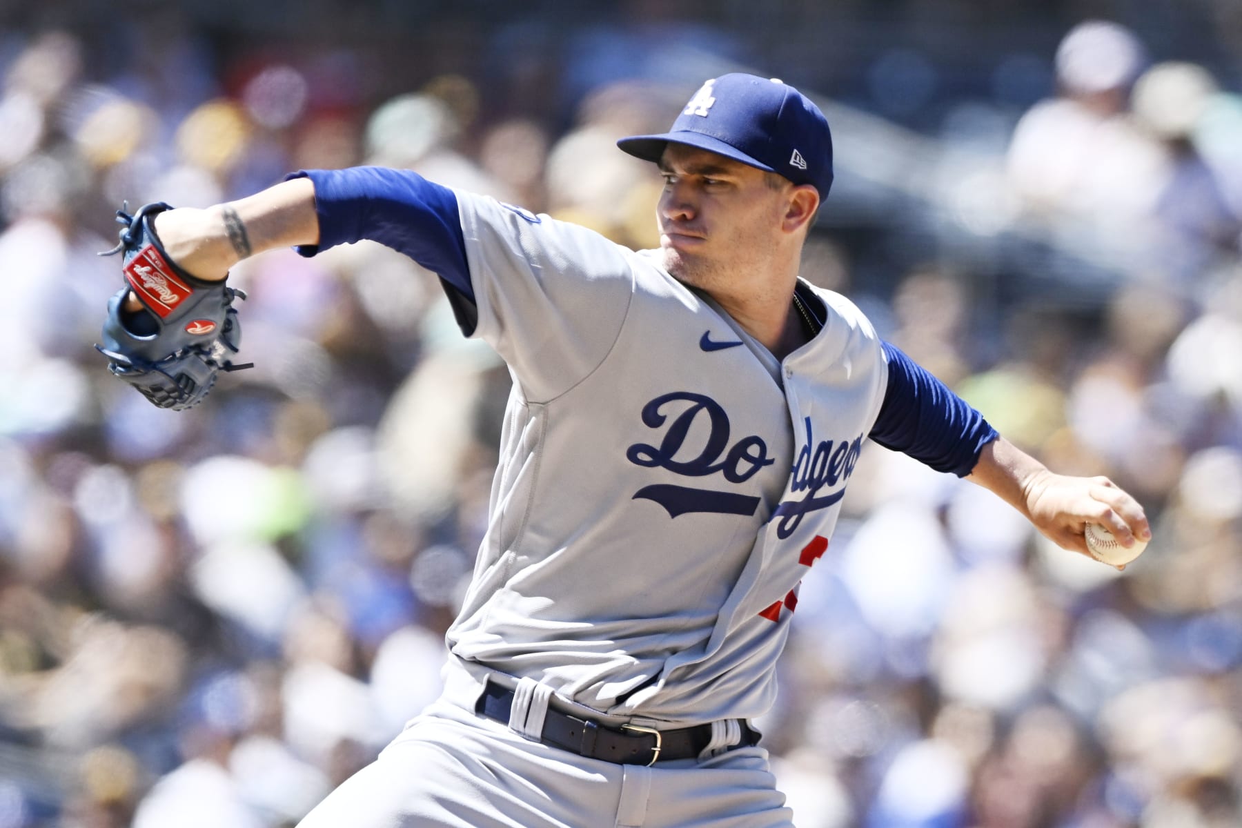 SAN DIEGO, CA - SEPTEMBER 11: Andrew Heaney #28 of the Los Angeles Dodgers pitches during the first inning of a baseball game against the San Diego Padres September 11, 2022 at Petco Park in San Diego, California. (Photo by Denis Poroy/Getty Images)