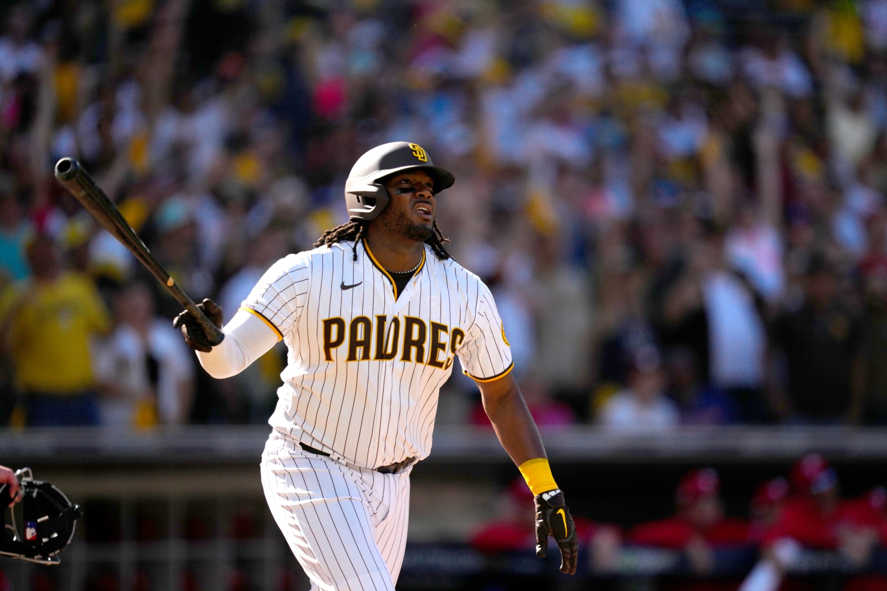 SAN DIEGO, CA - OCTOBER 19: Josh Bell #24 of the San Diego Padres watches his home run ball in the second inning of Game 2 of the NLCS between the Philadelphia Phillies and the San Diego Padres at Petco Park on Wednesday, October 19, 2022 in San Diego, California. (Photo by Daniel Shirey/MLB Photos via Getty Images)