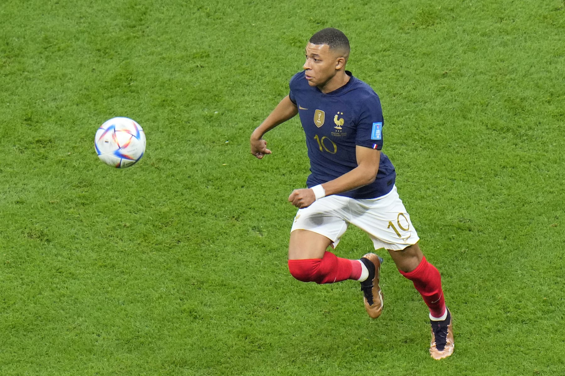 France's Kylian Mbappe in action during the World Cup quarterfinal soccer match between England and France, at the Al Bayt Stadium in Al Khor, Qatar, Saturday, Dec. 10, 2022. (AP Photo/Hassan Ammar)